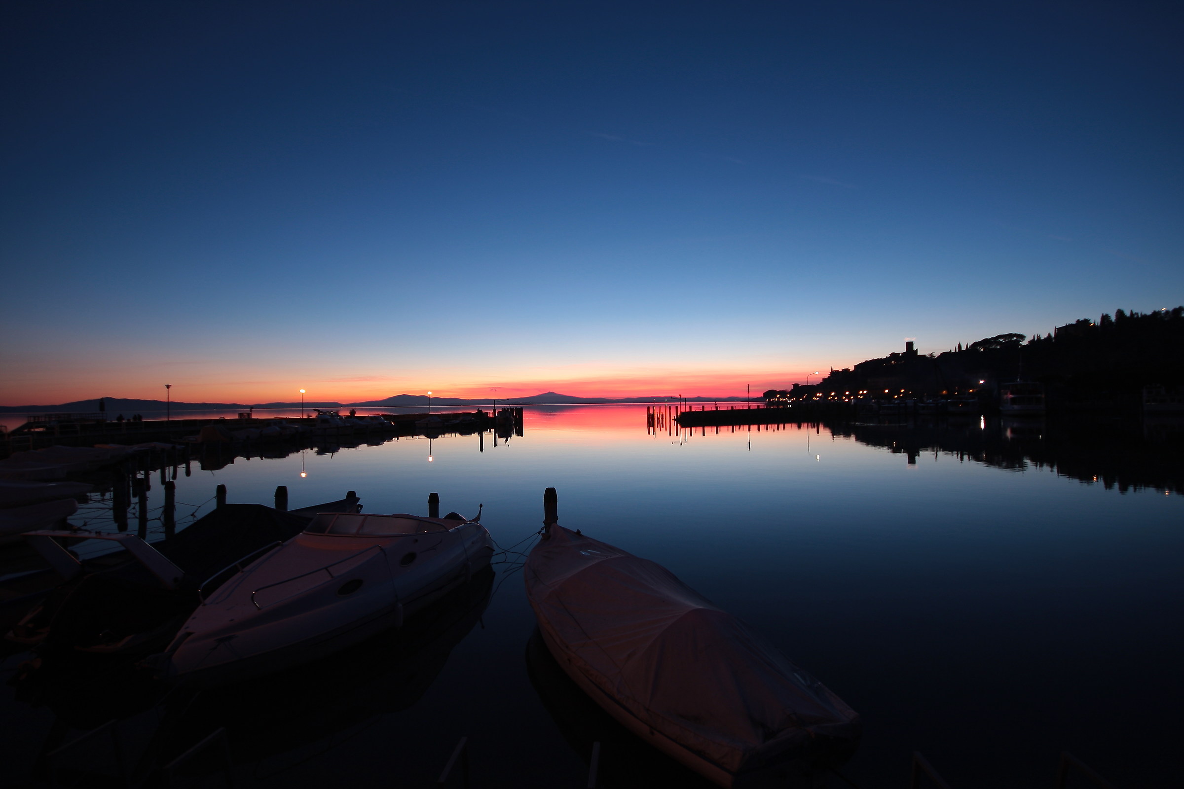 Sunset in the harbor of Passignano
