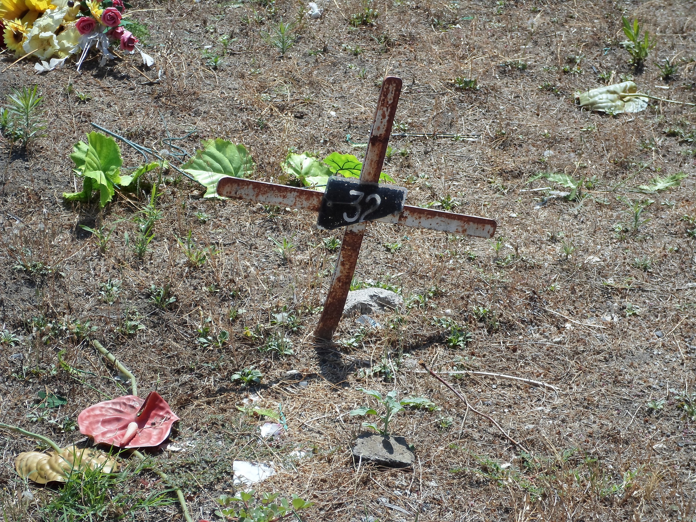 Even in death he remains poor