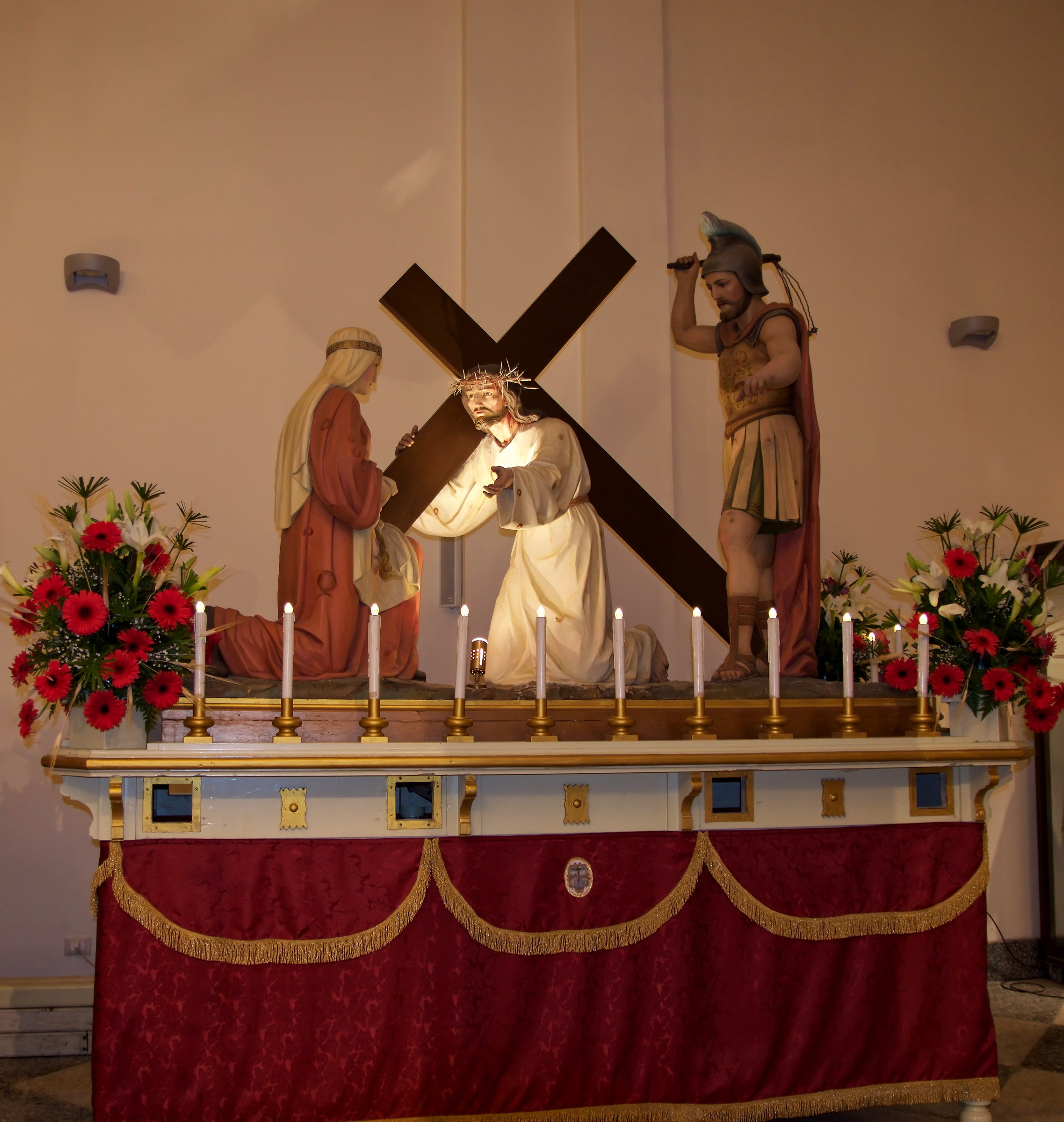 St. Veronica wipes the face of Christ