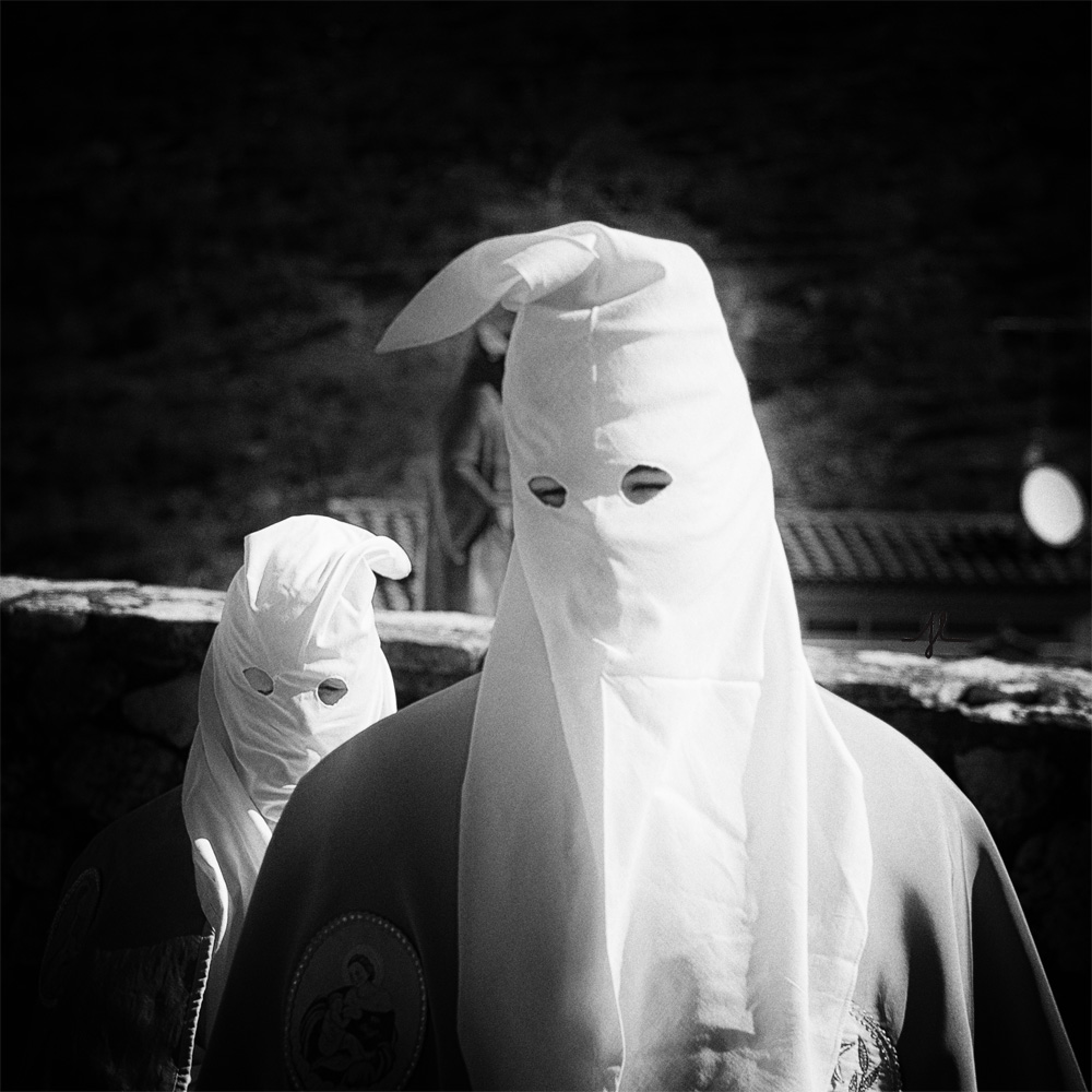 procession of hooded