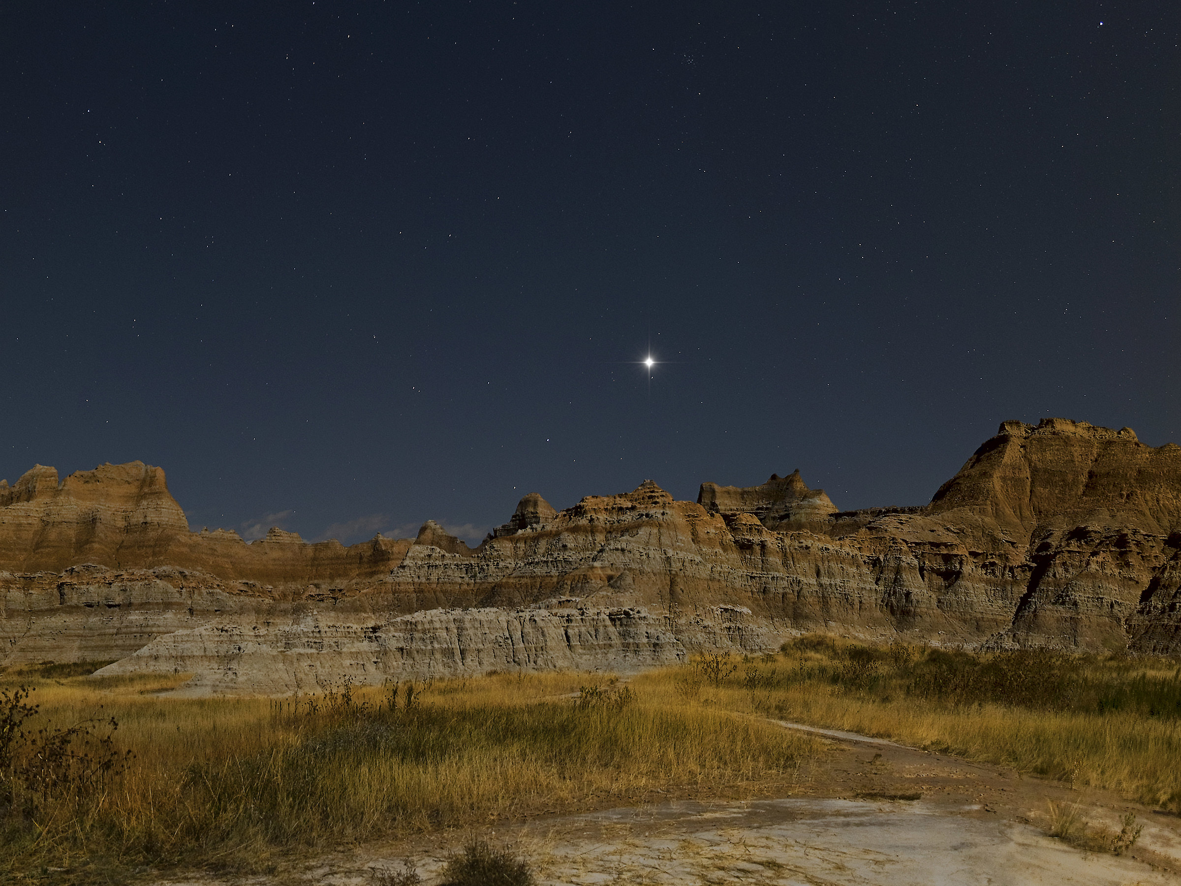 Badlands and Jupiter in Moonlight