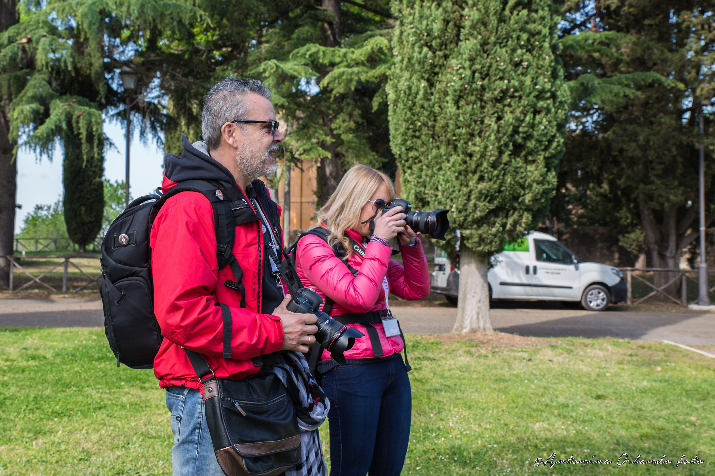 Photographers in red