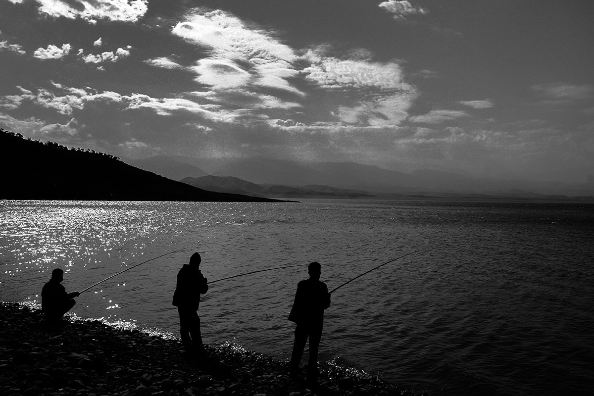 Three men fishing