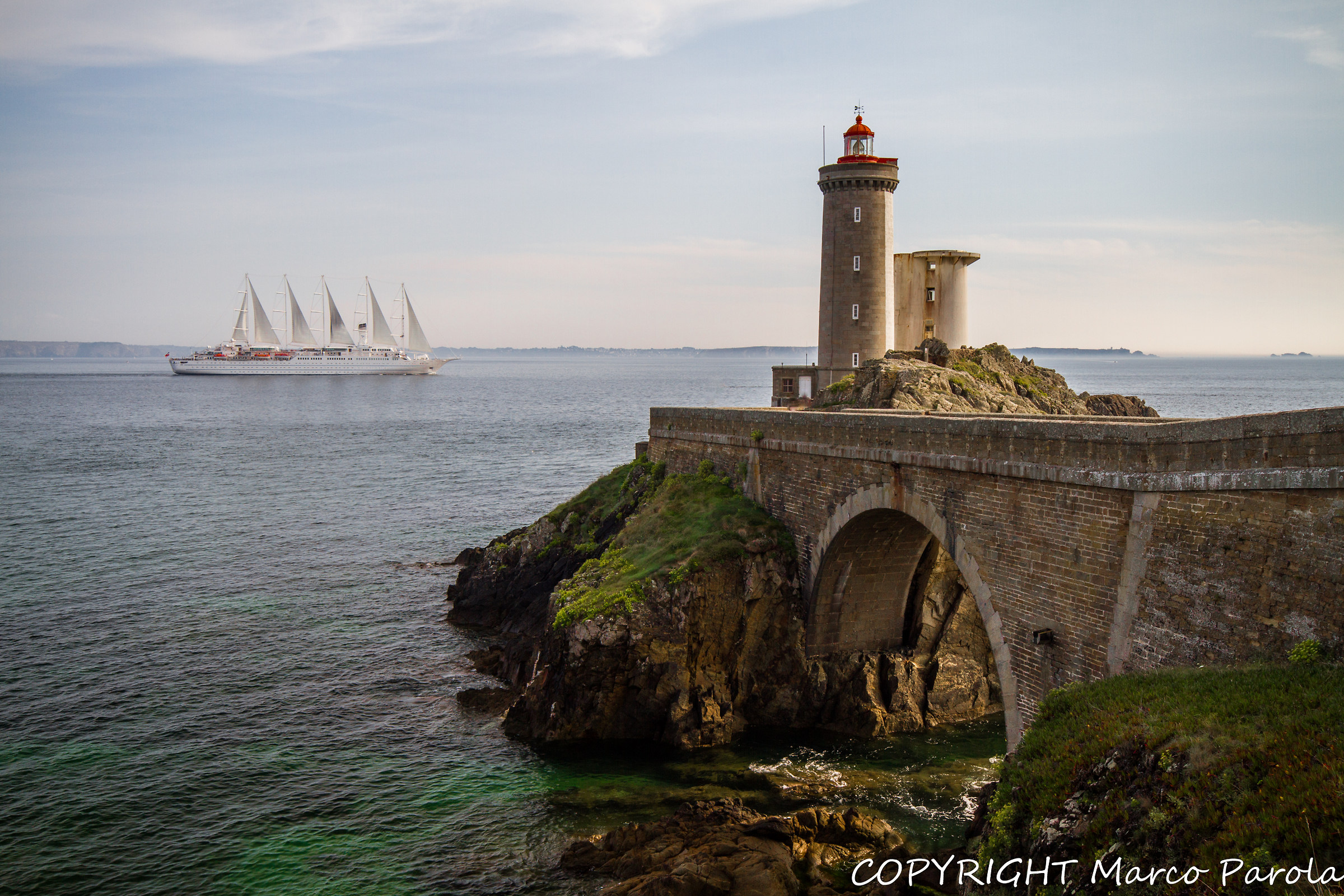 Sailing ship and the lighthouse of Petit Minou