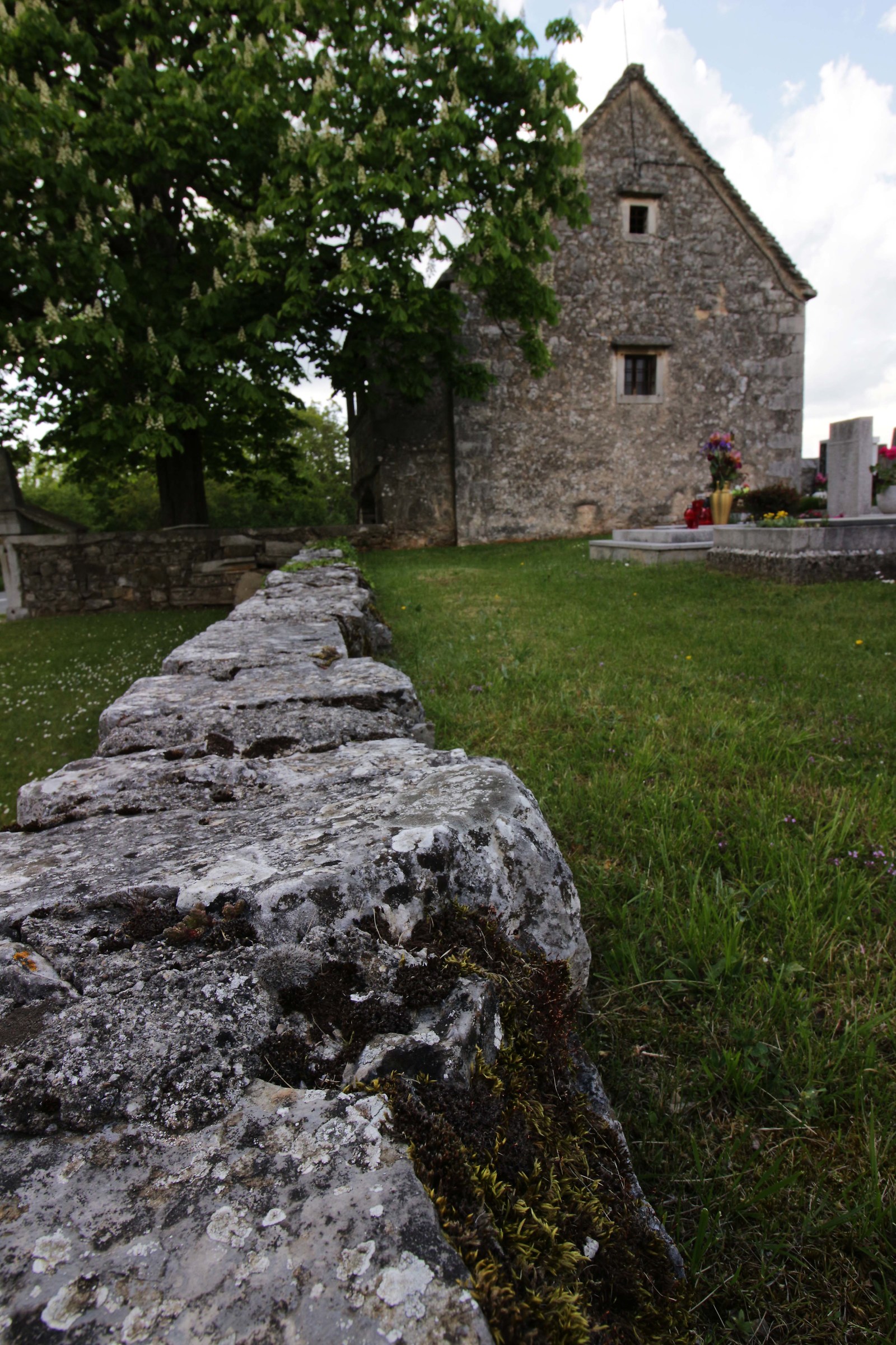 The wall in the karst stone cemetery