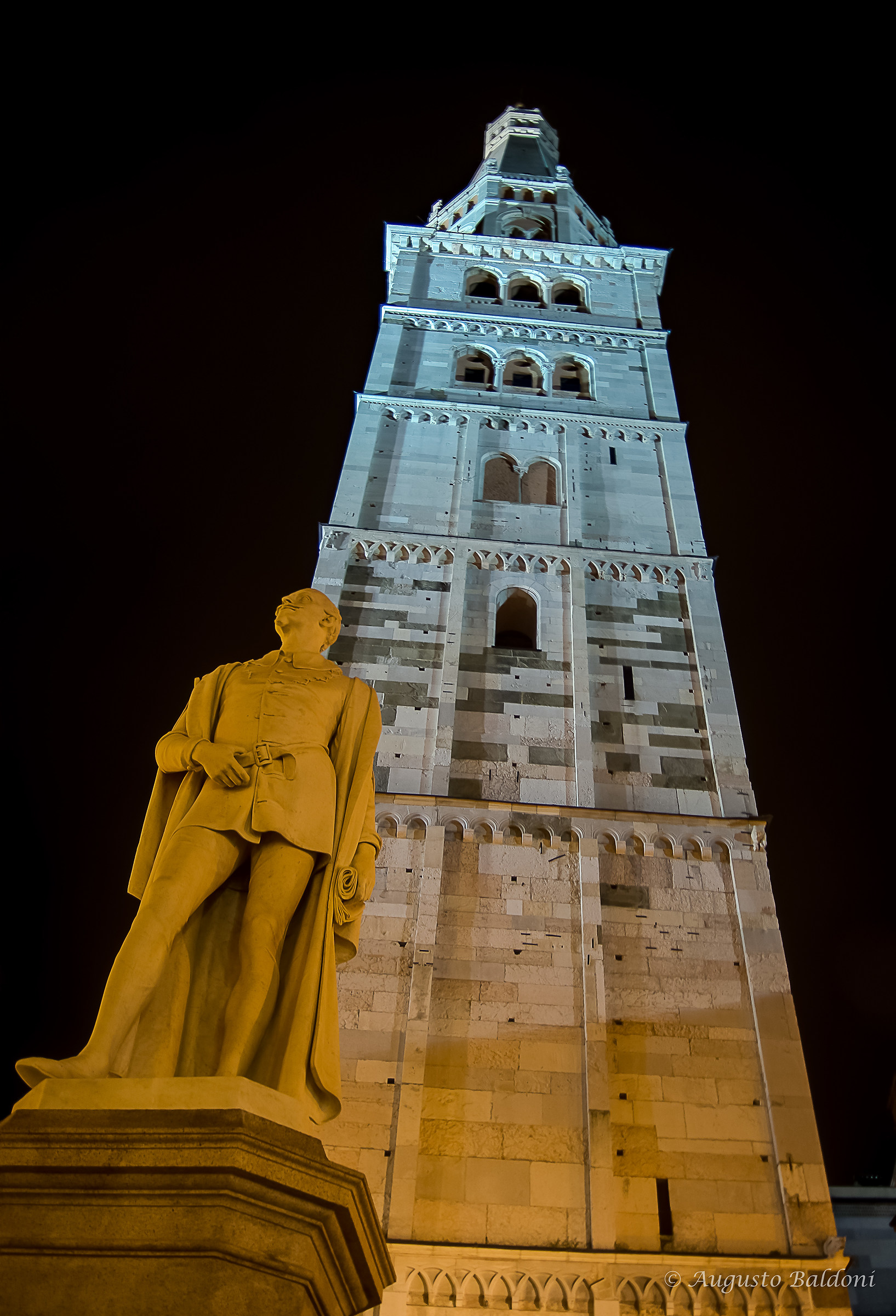 Modena - Ghirlandina with the monument to Tassoni