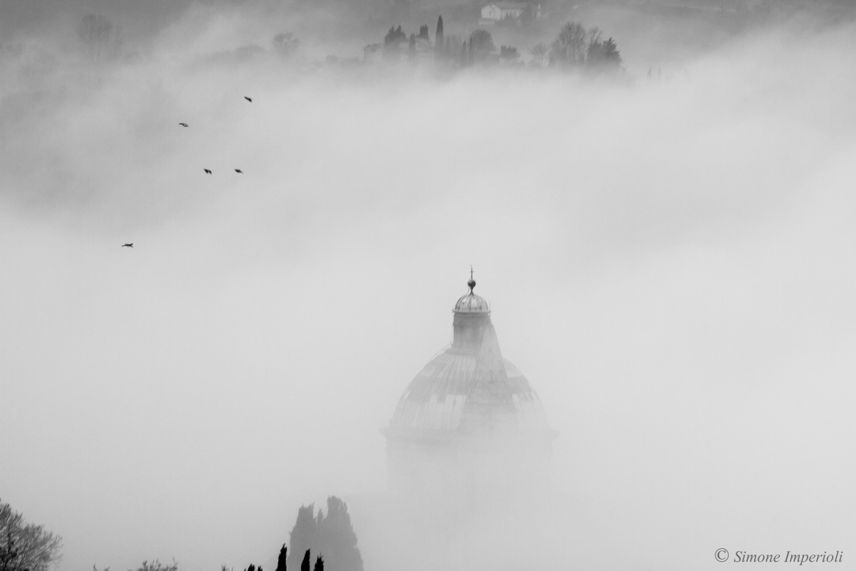 fog over the Tuscan hills
