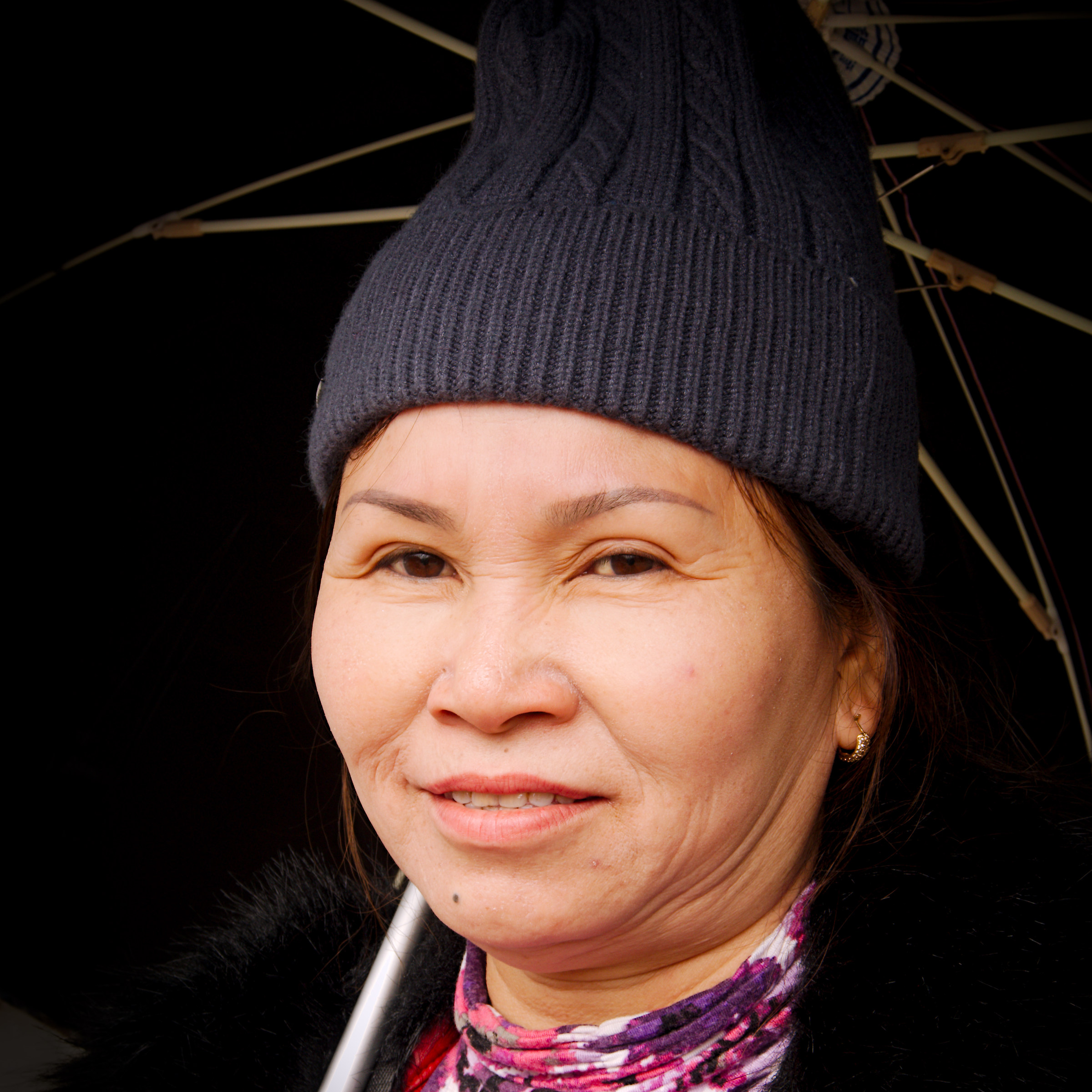 2016 Vietnam, Sapa. With black umbrella in the sun.
