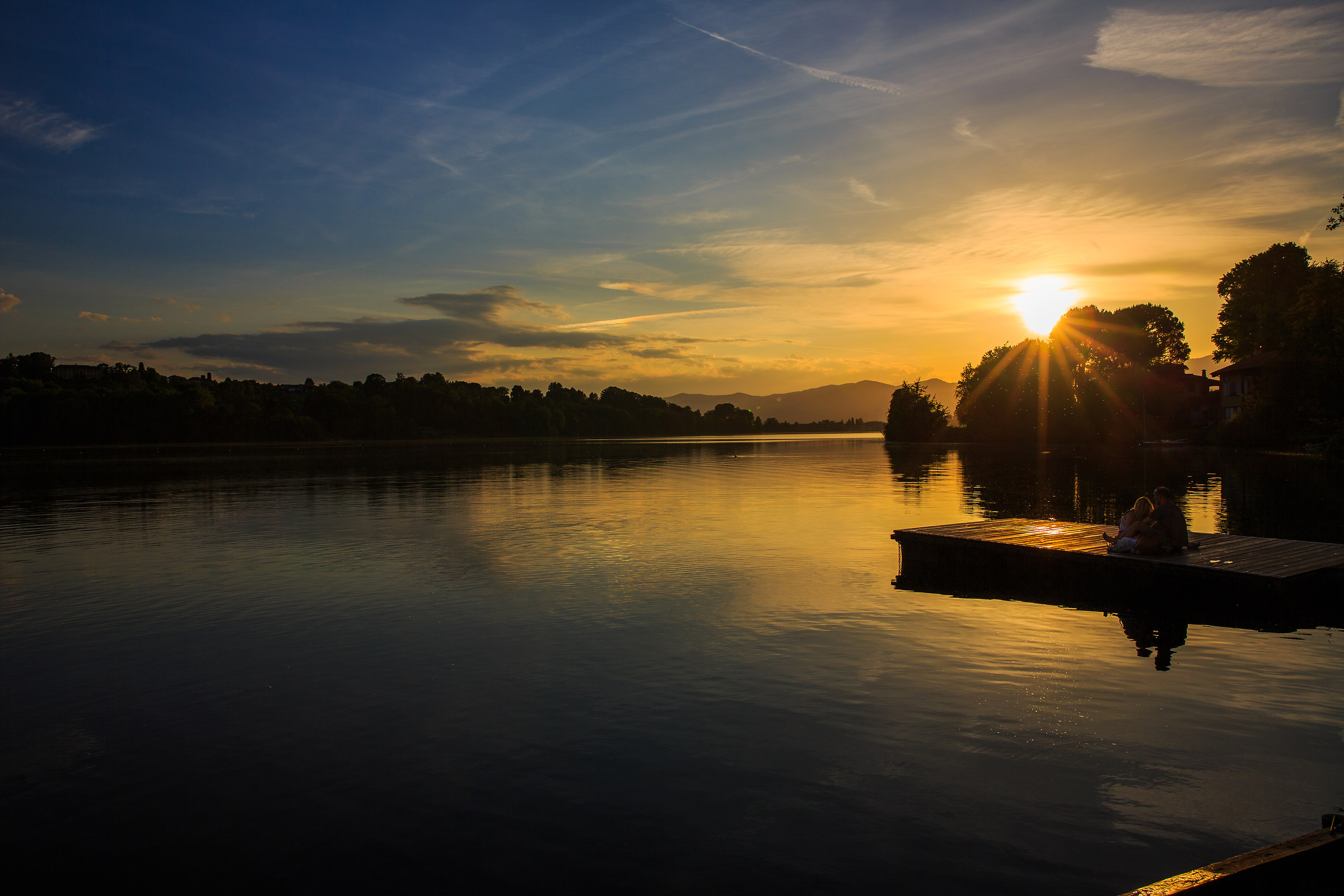 Lovers in the sunset at Lake Monate