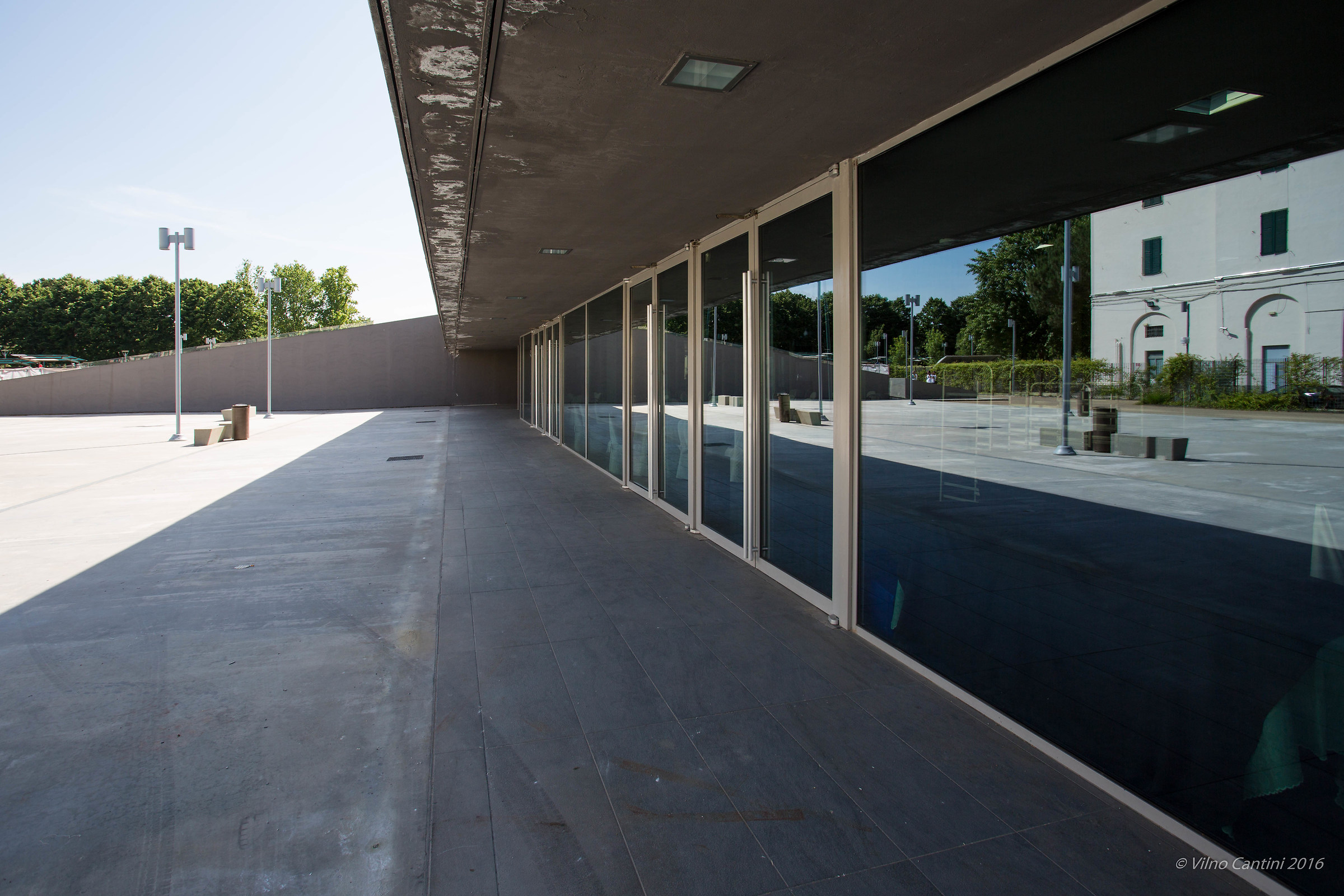 Parking reflected on bistro