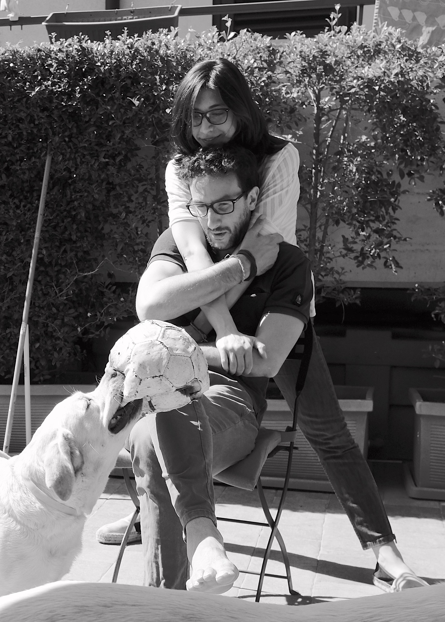 a guy, his girlfriend, their dog