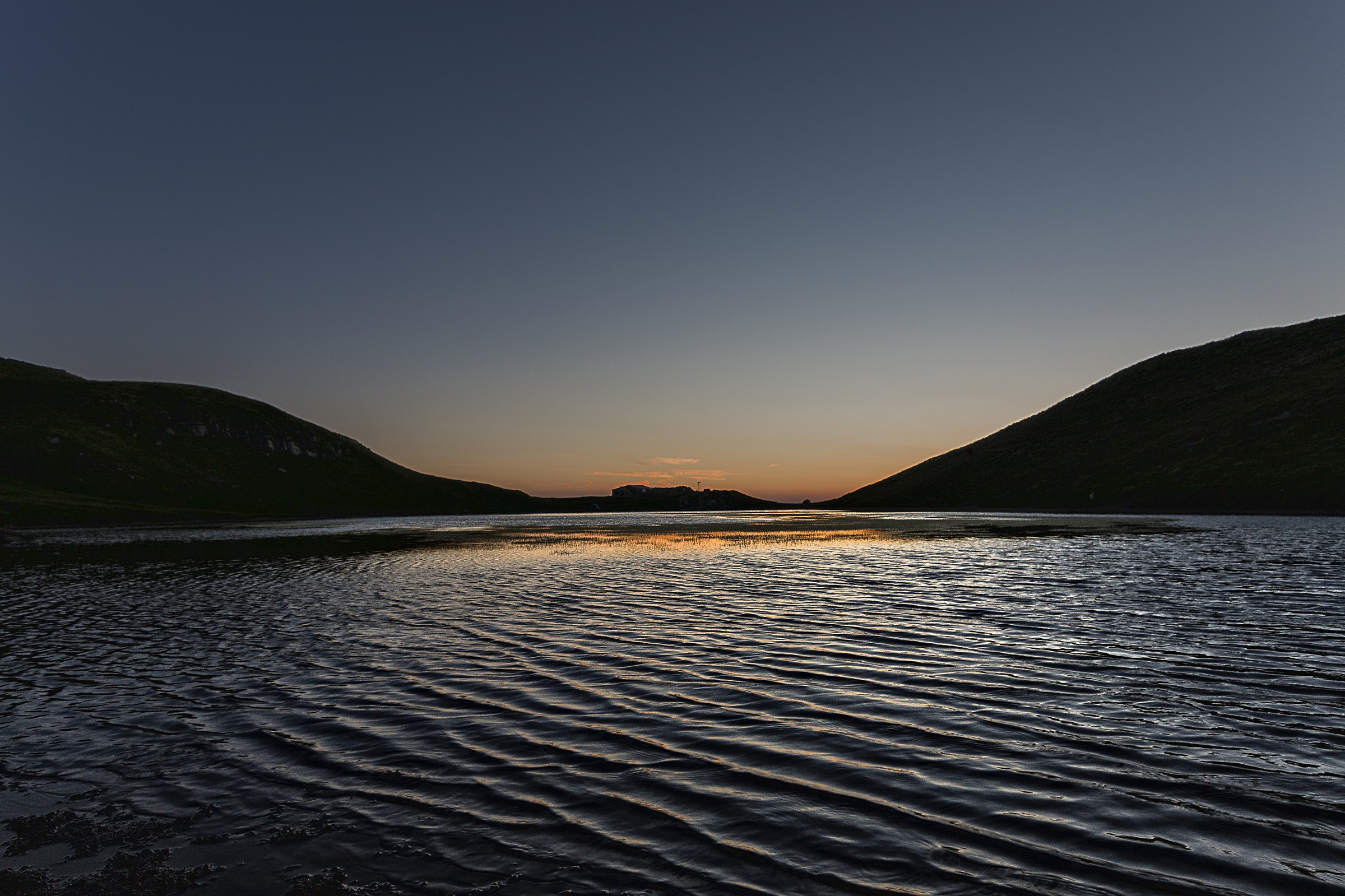 sunset over the lake Scaffaiolo