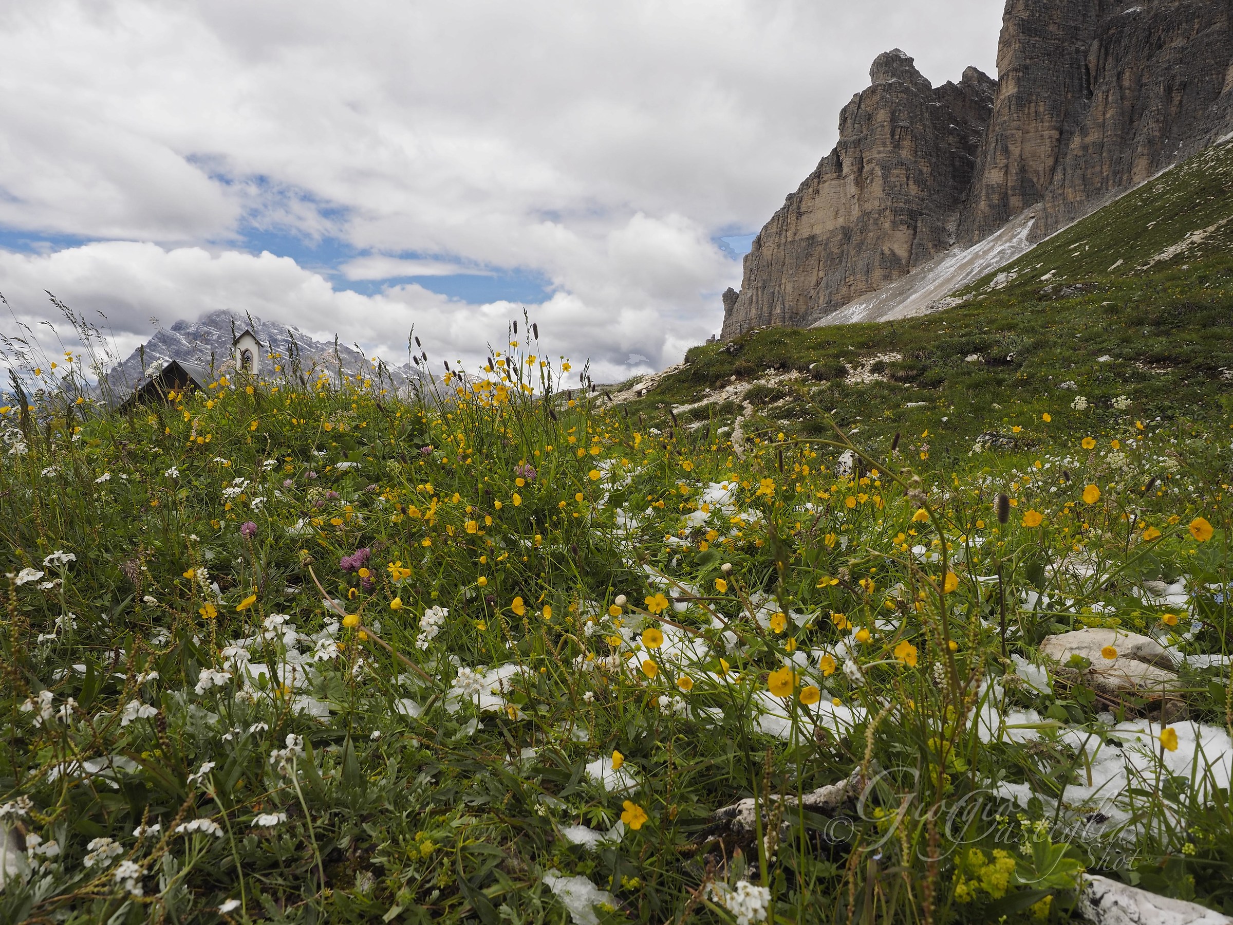 Snow in July under the Three Peaks