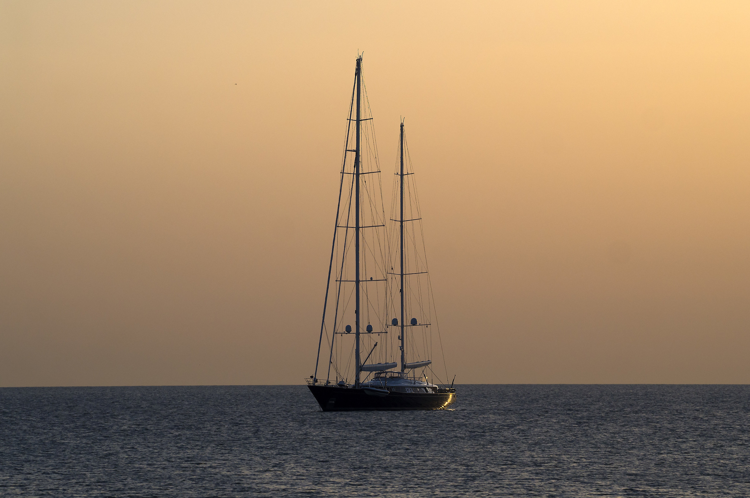 The sunrise and sailing ship