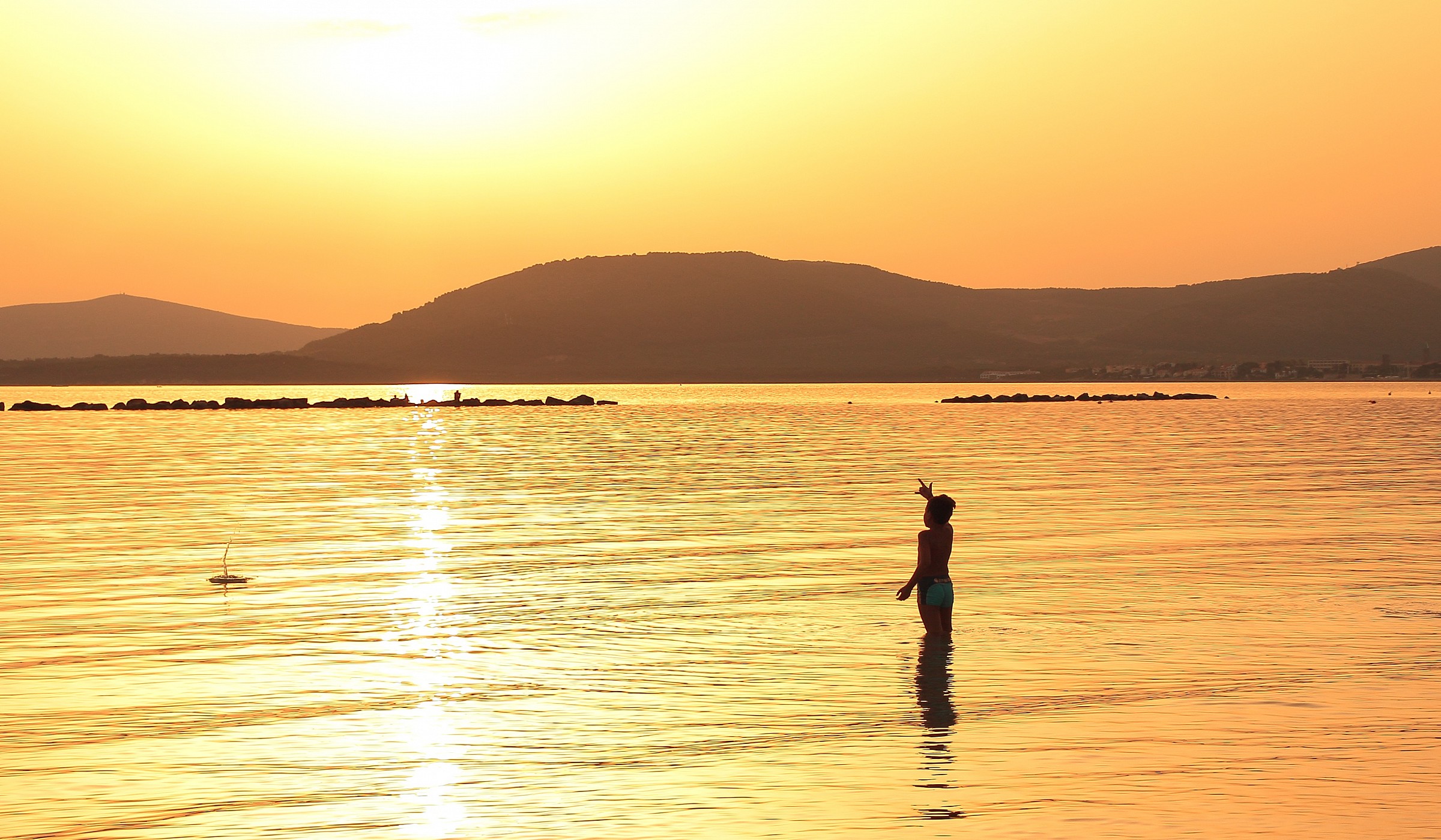 alghero baby sea at sunset