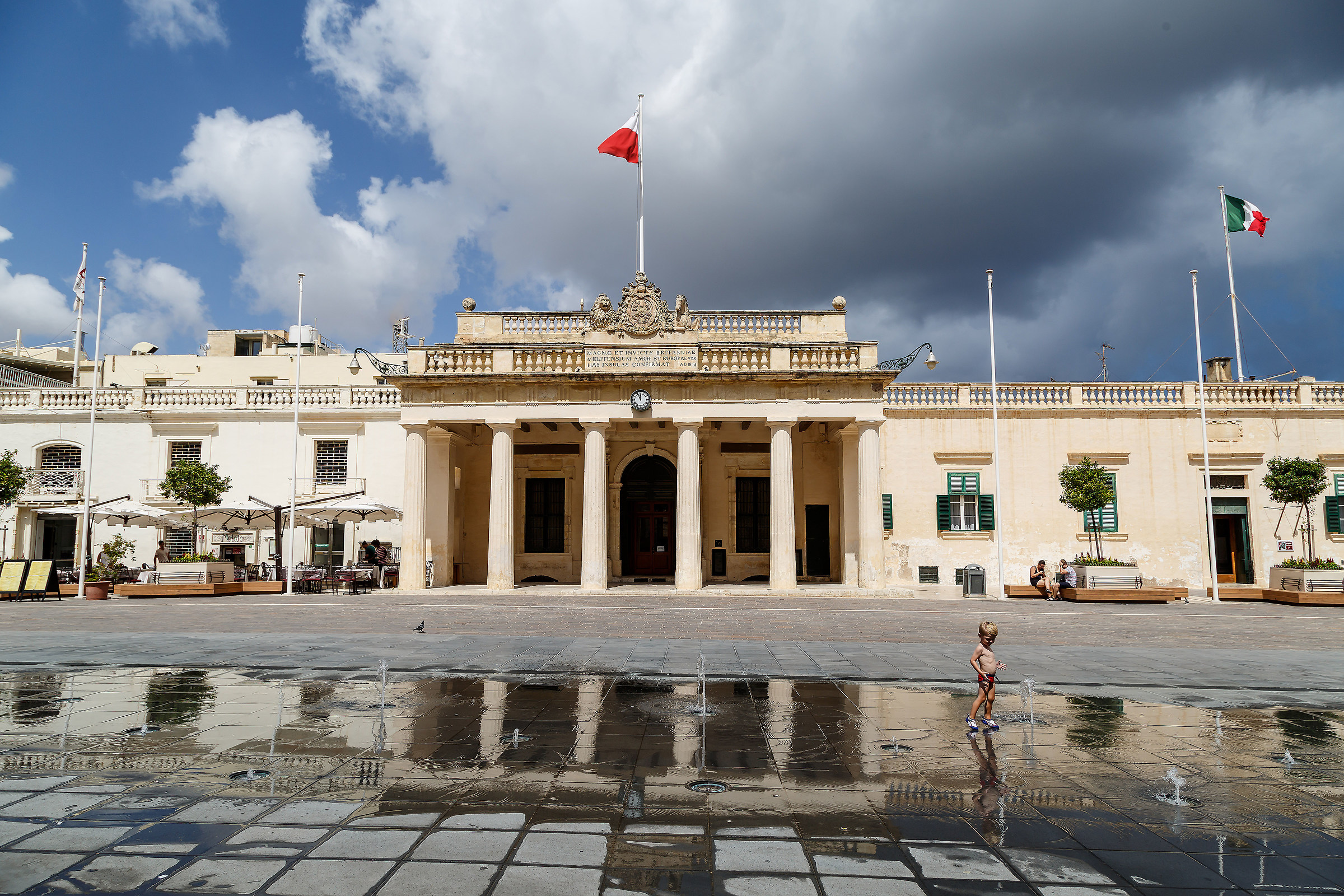 Valletta - The child, the fountain and flags