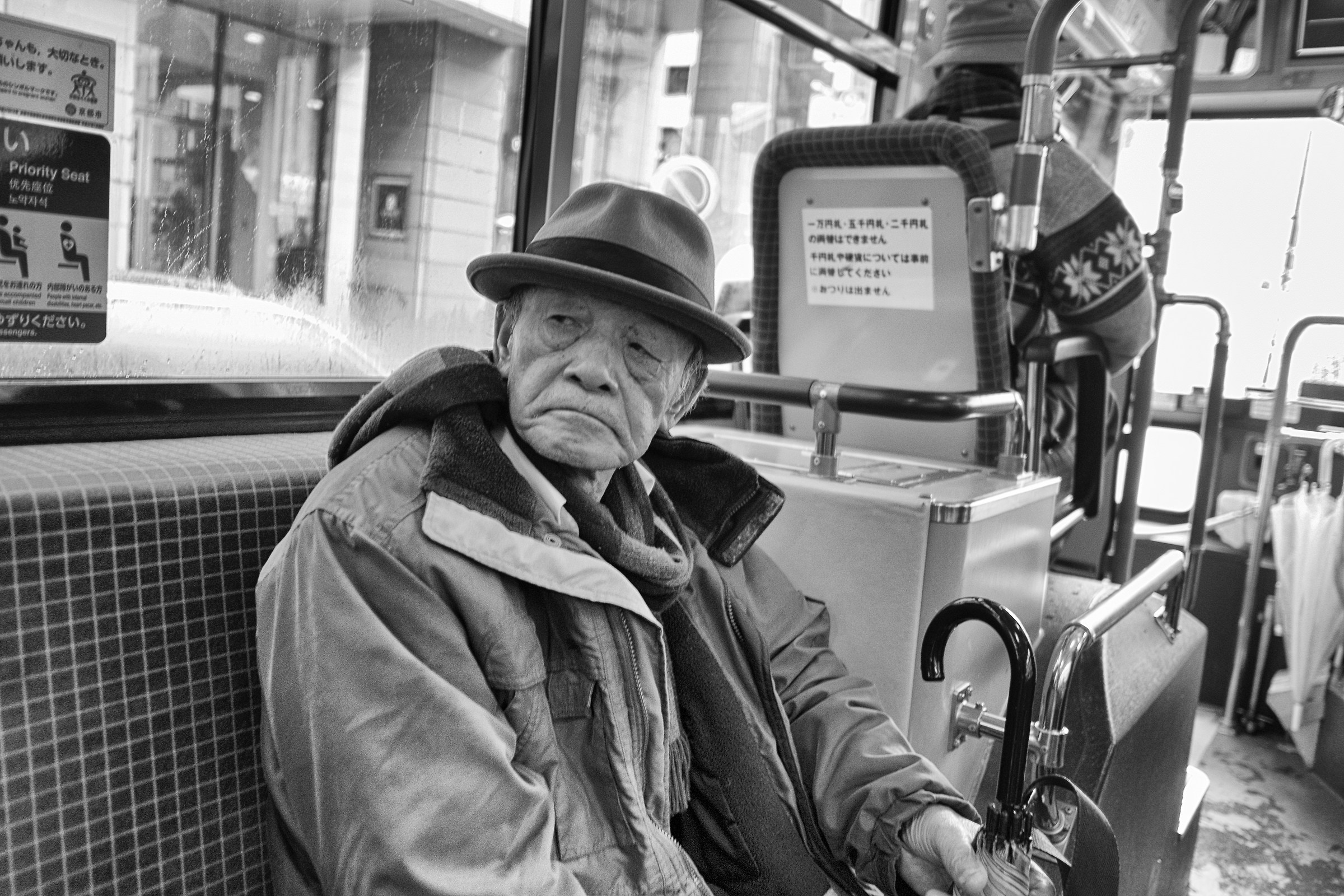 old man in a bus