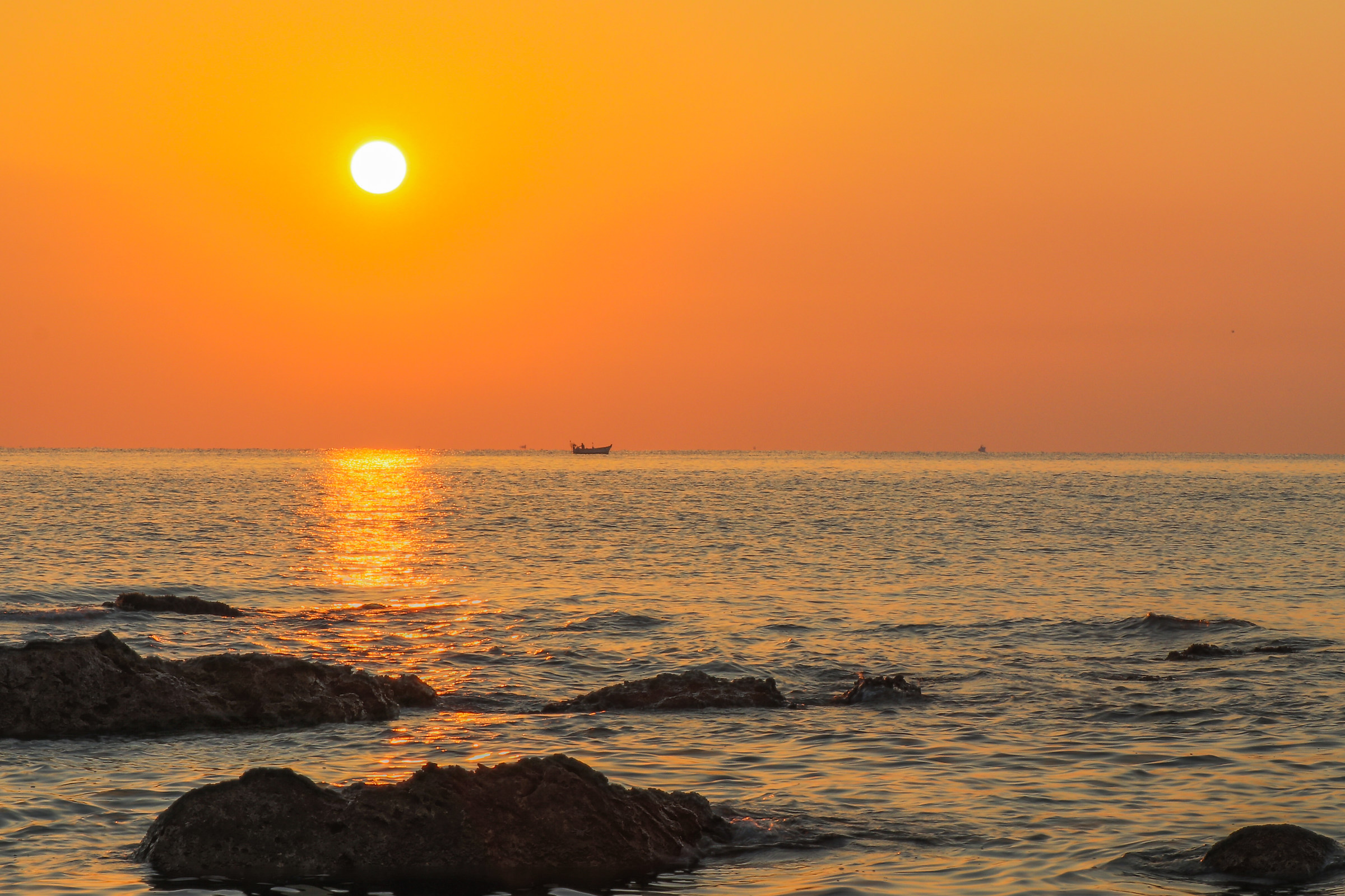 In the shadow of the first sun had awakened a fisherman