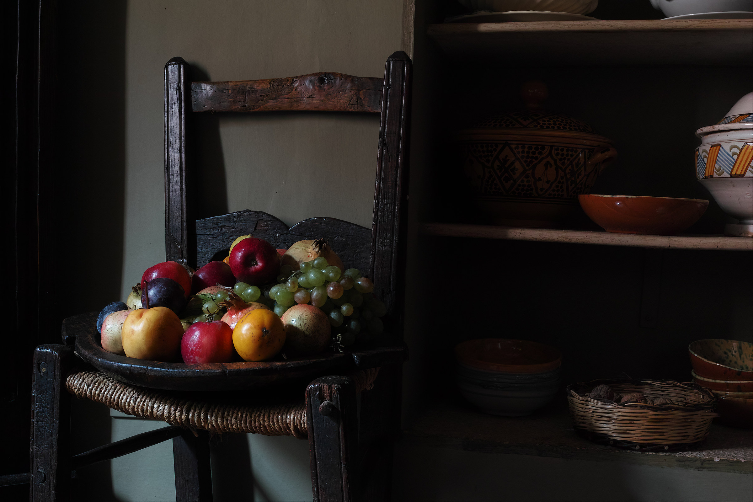 Basket of fruit on chair