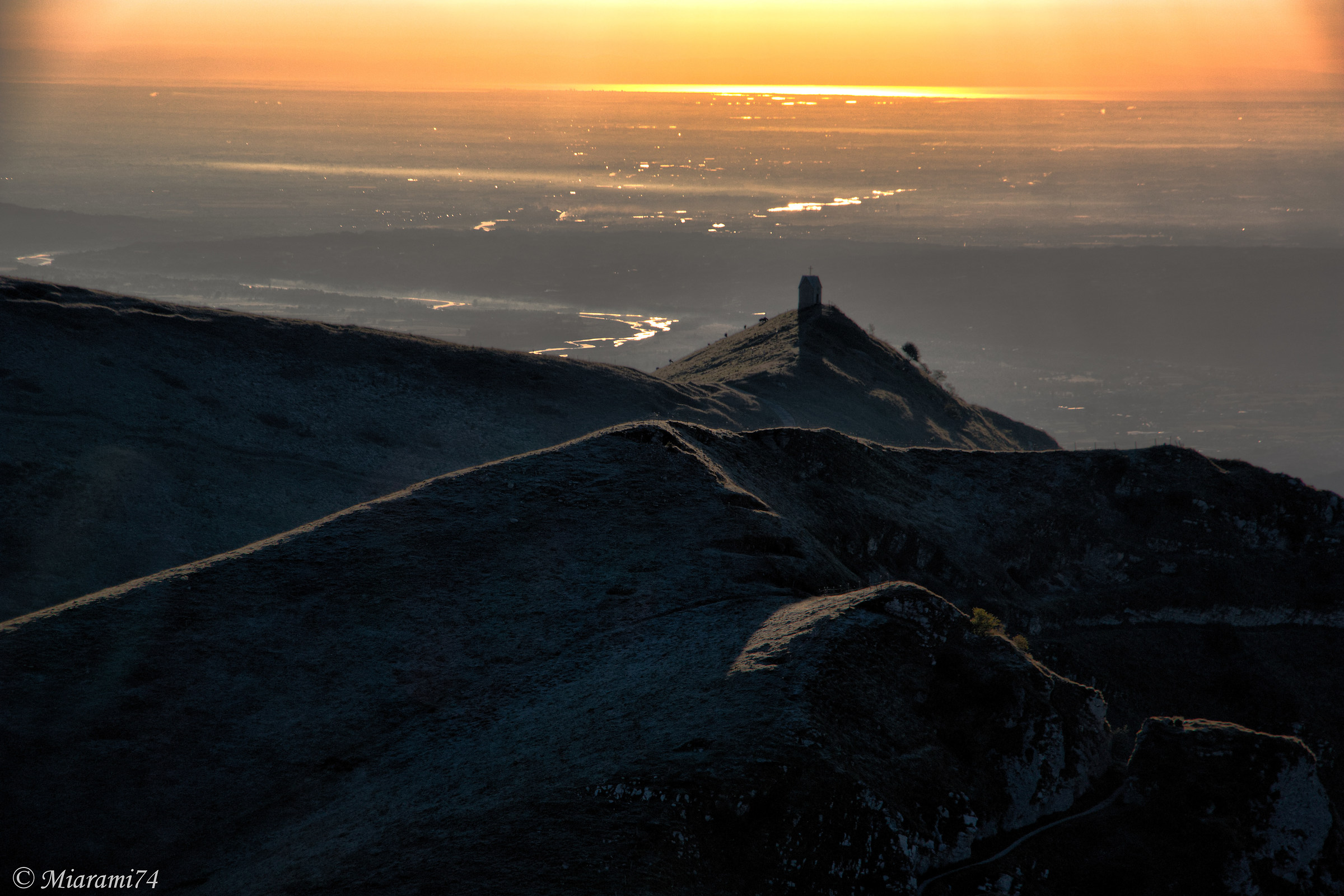 Snow greets the sun kissing the Venzia lagoon