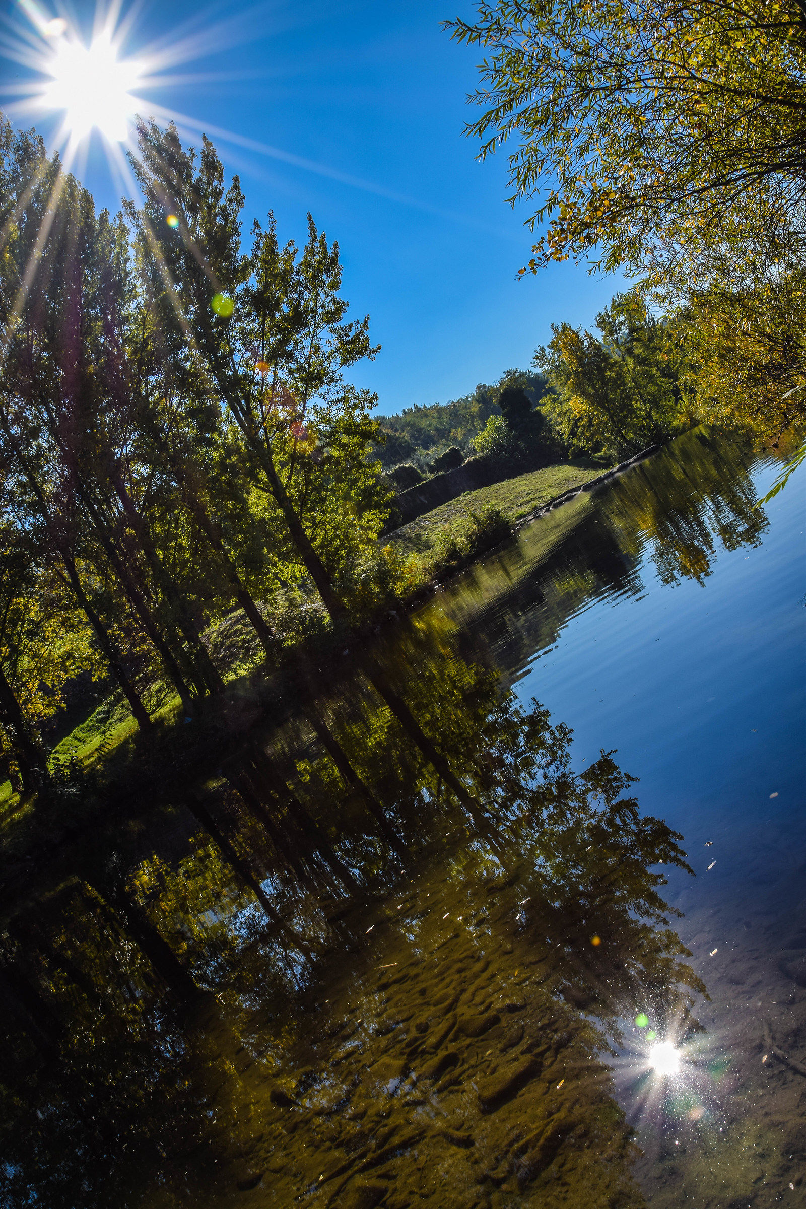 Reflection sun on the river Bisenzio - Prato