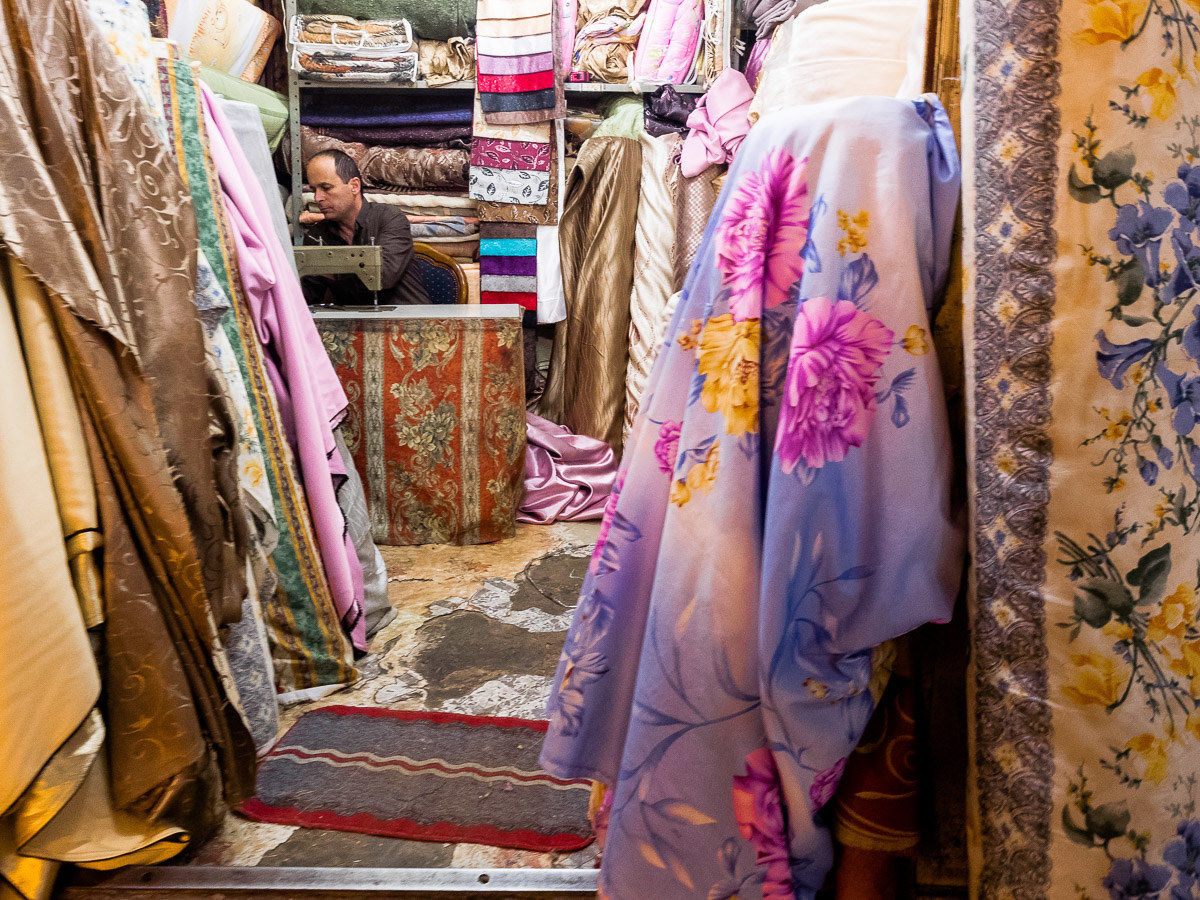 Bazaars of the Old City, a textile salesman