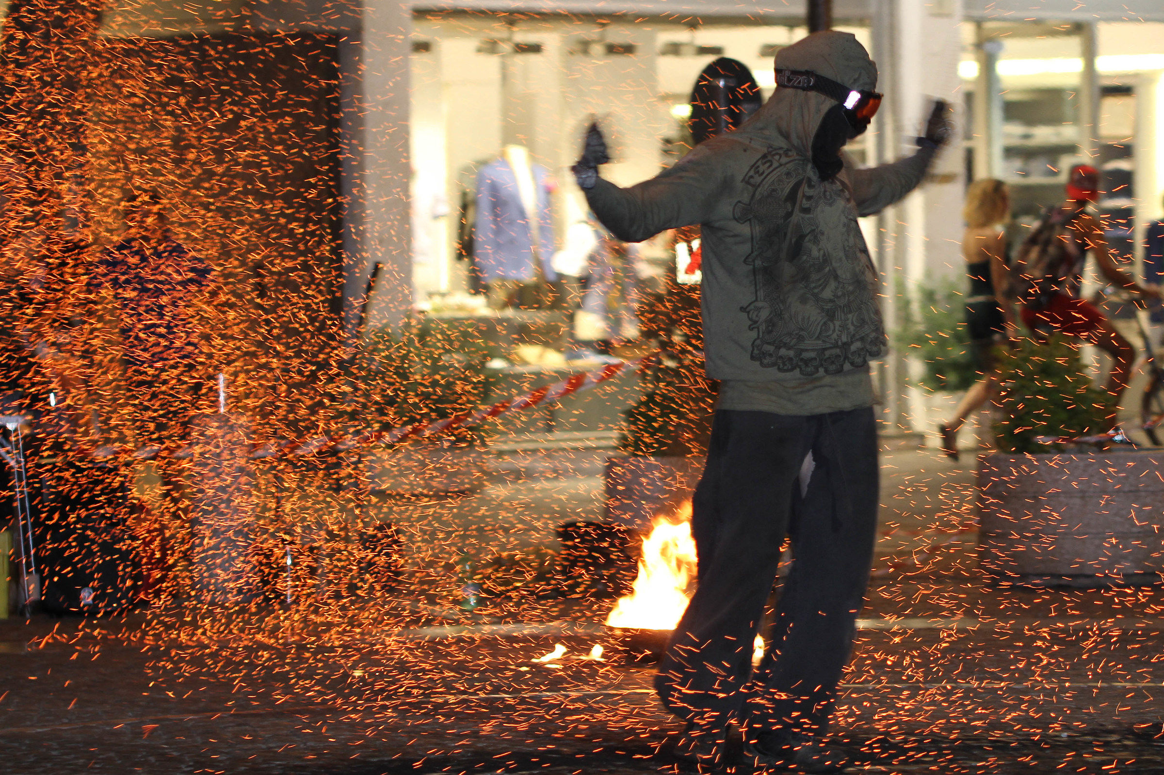 Street artist plays with fire