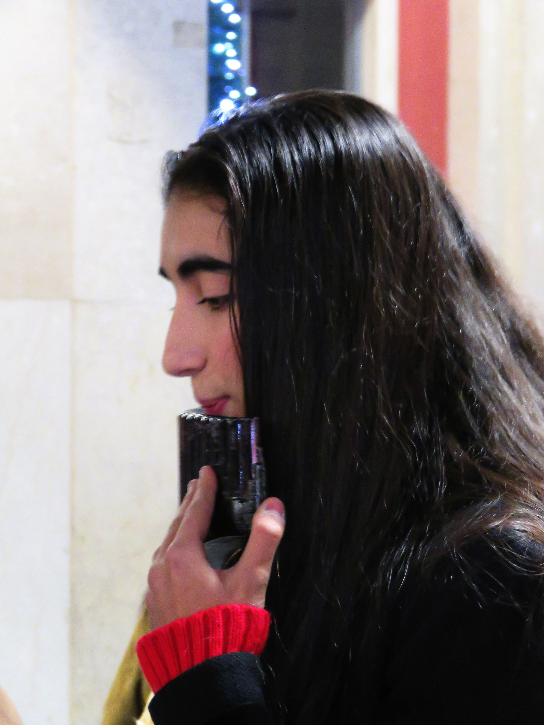 Woman playing a panpipe