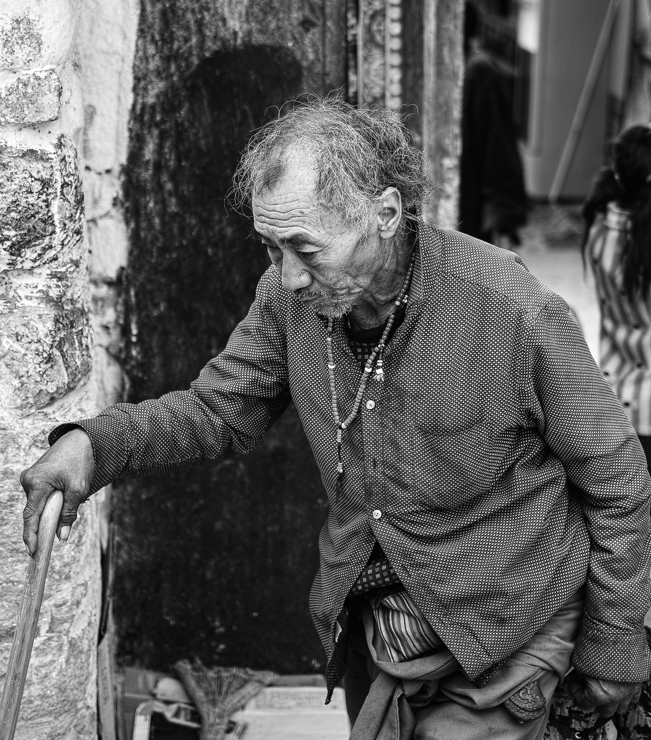 The stick in his hand