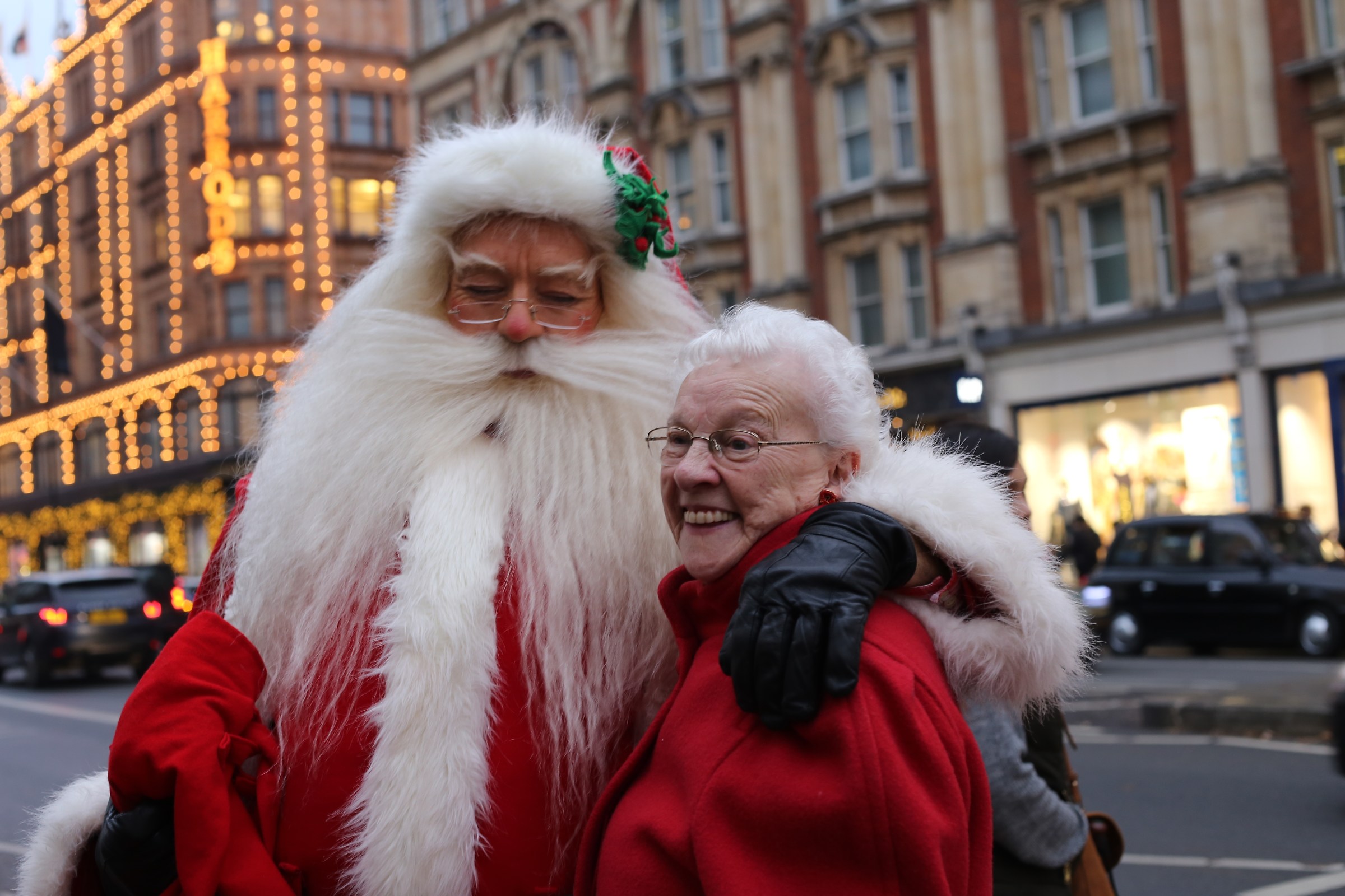 Santa and Mrs. (in red)