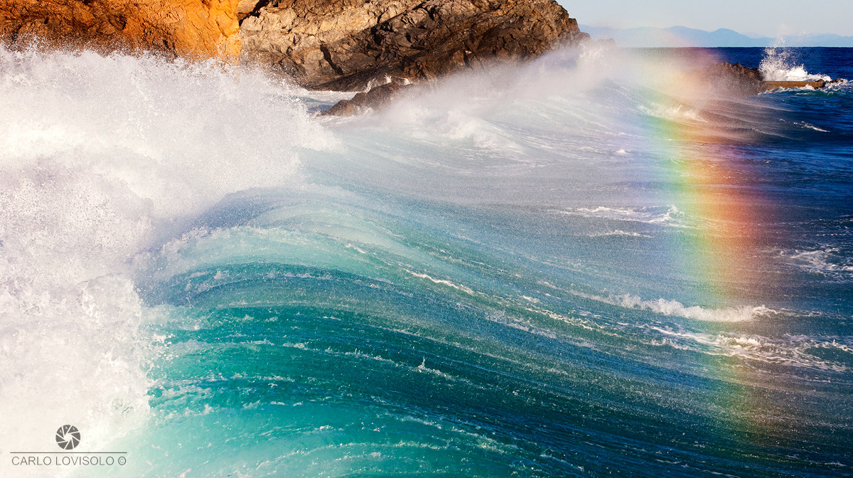Ligurian Sea waves and rainbow