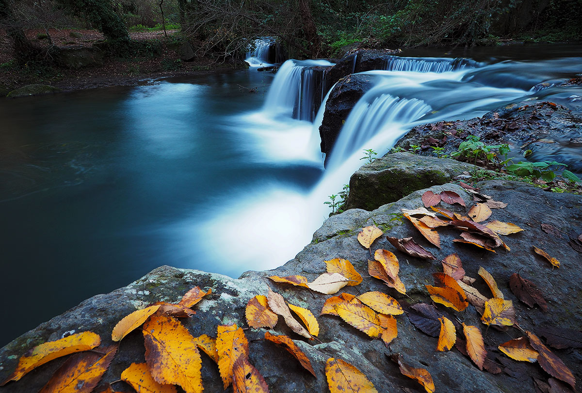On edge of waterfall