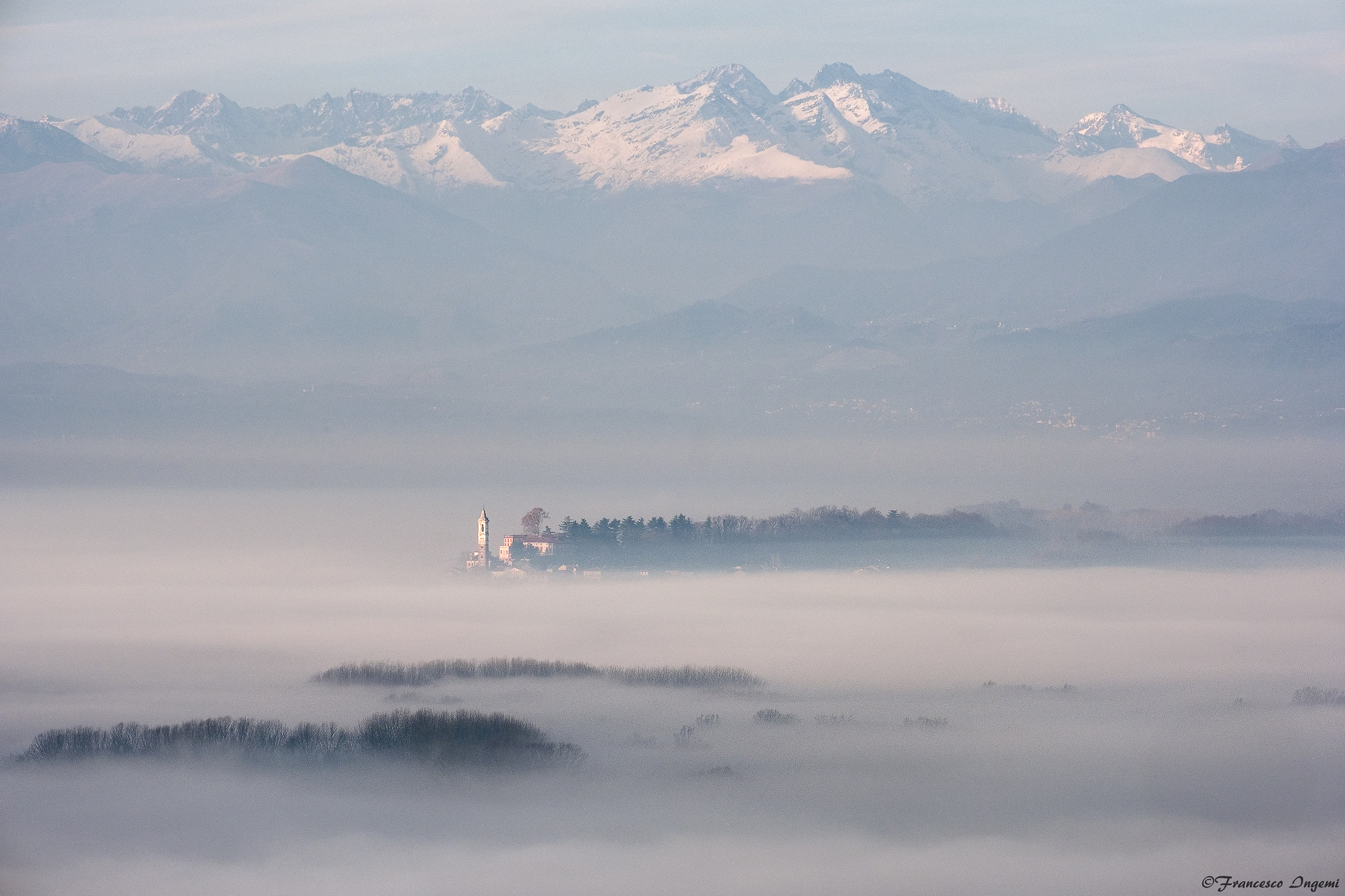 Azeglio in view of mist from Bertignano (bi).