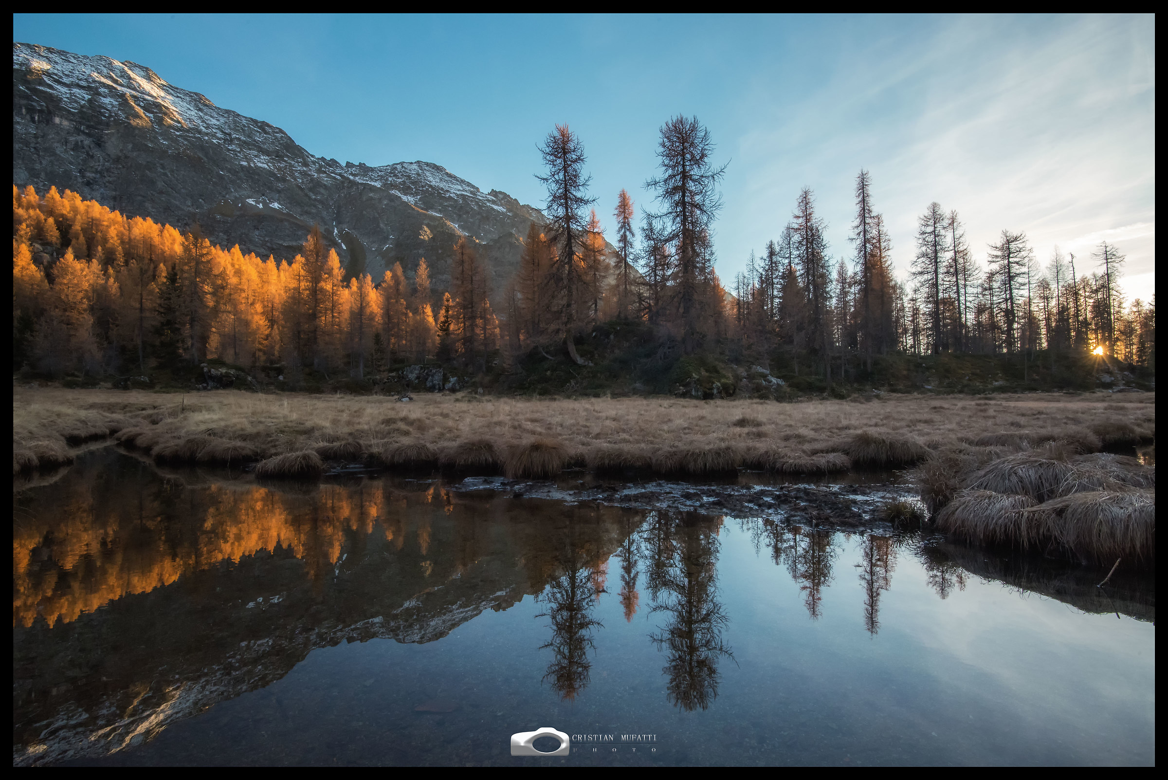 Autumn reflections on the lake Mufulè. Valmalenco
