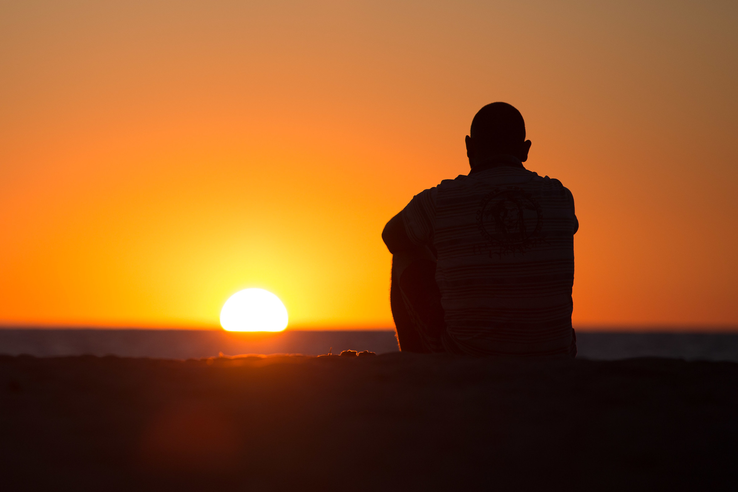 The Thinker at sunset