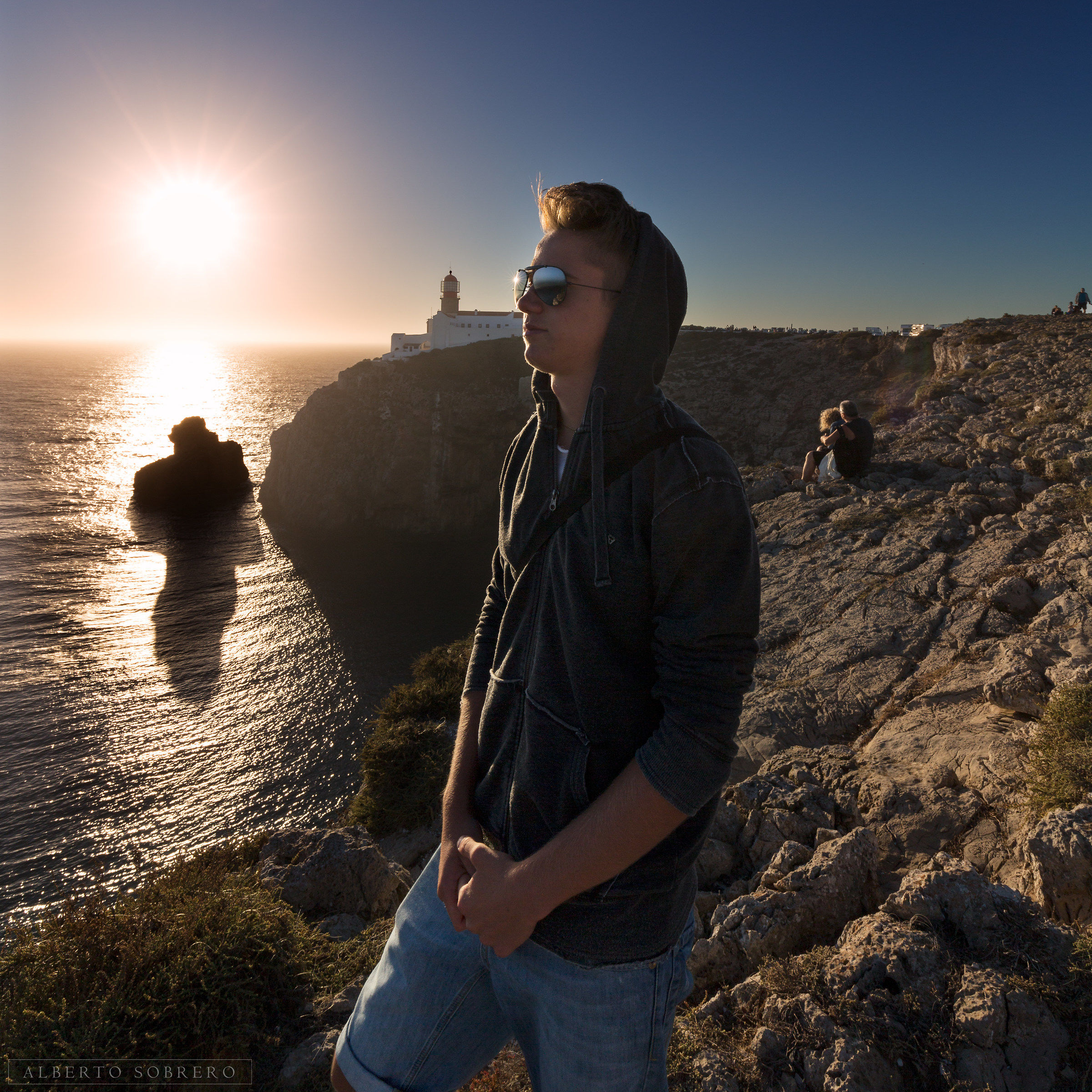 Posing between light and shadow