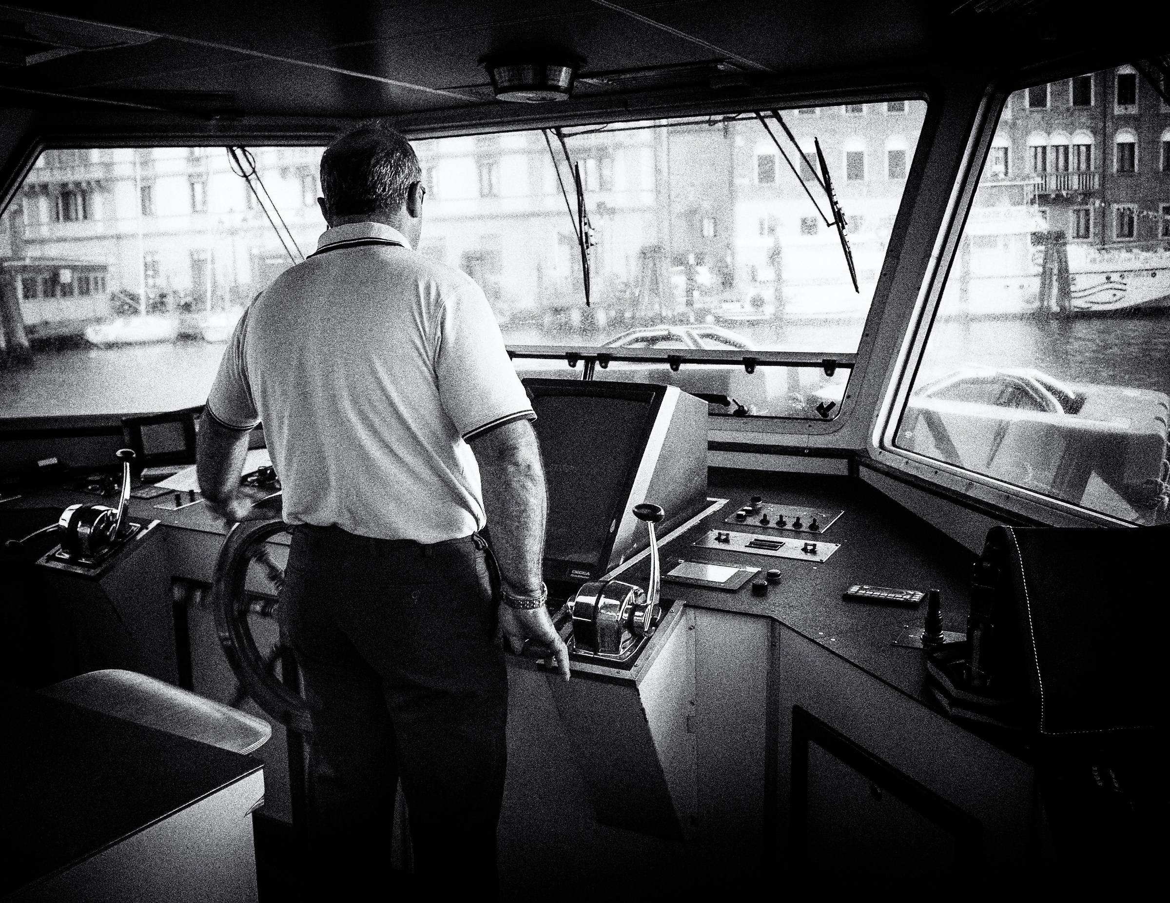 at the helm