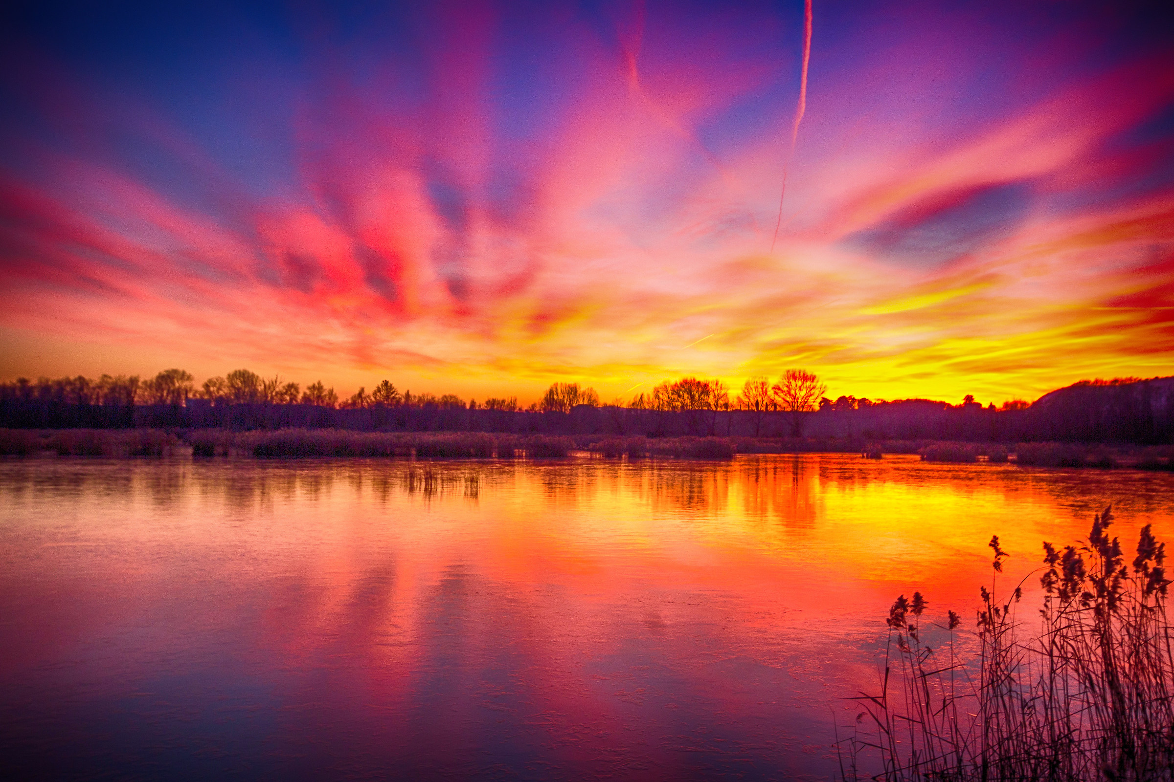 Bog with fiery sunset