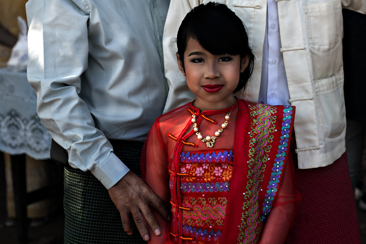 Little girl at a wedding in Burma