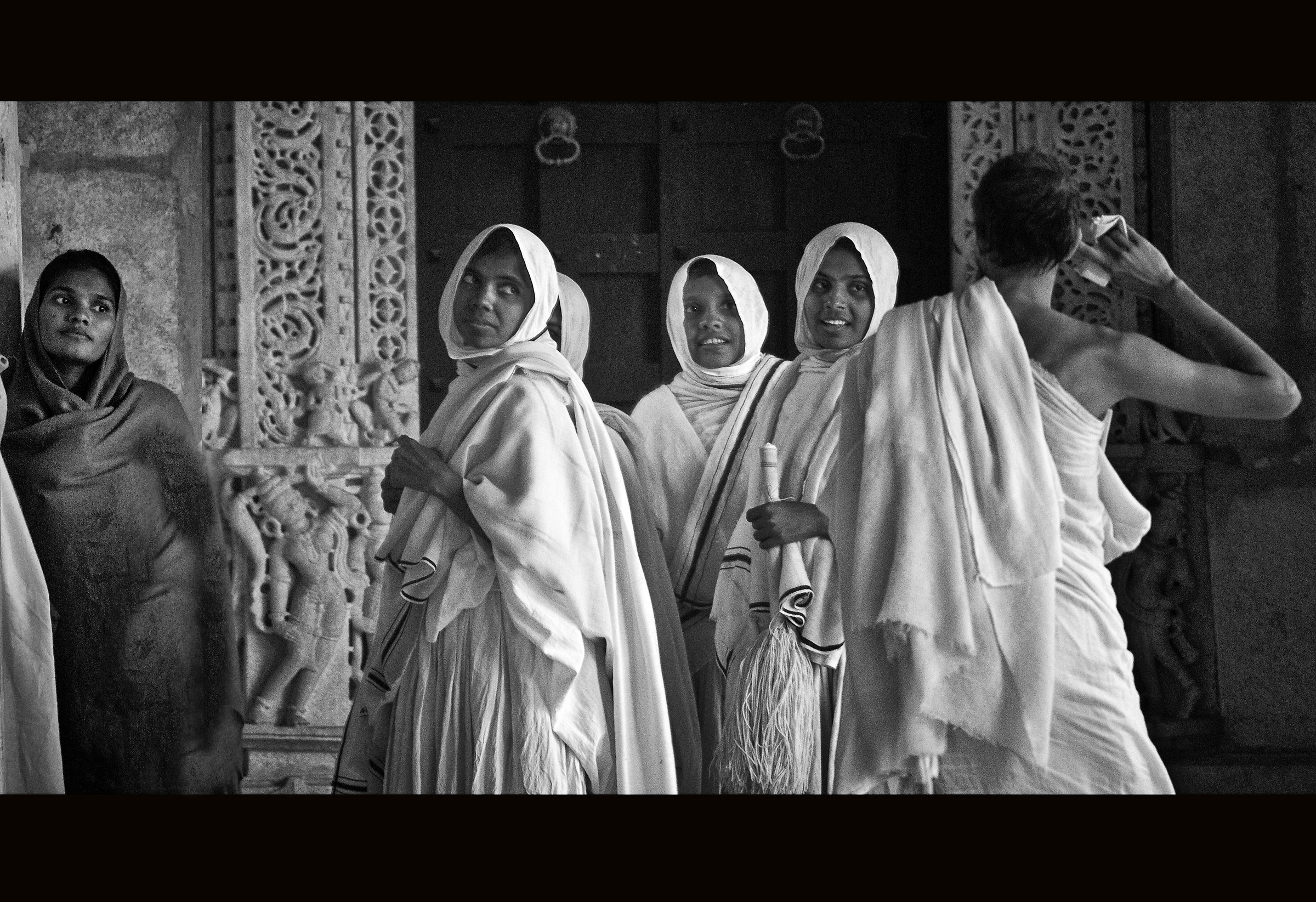 Jain priests in the temple in the corner of the excluded!