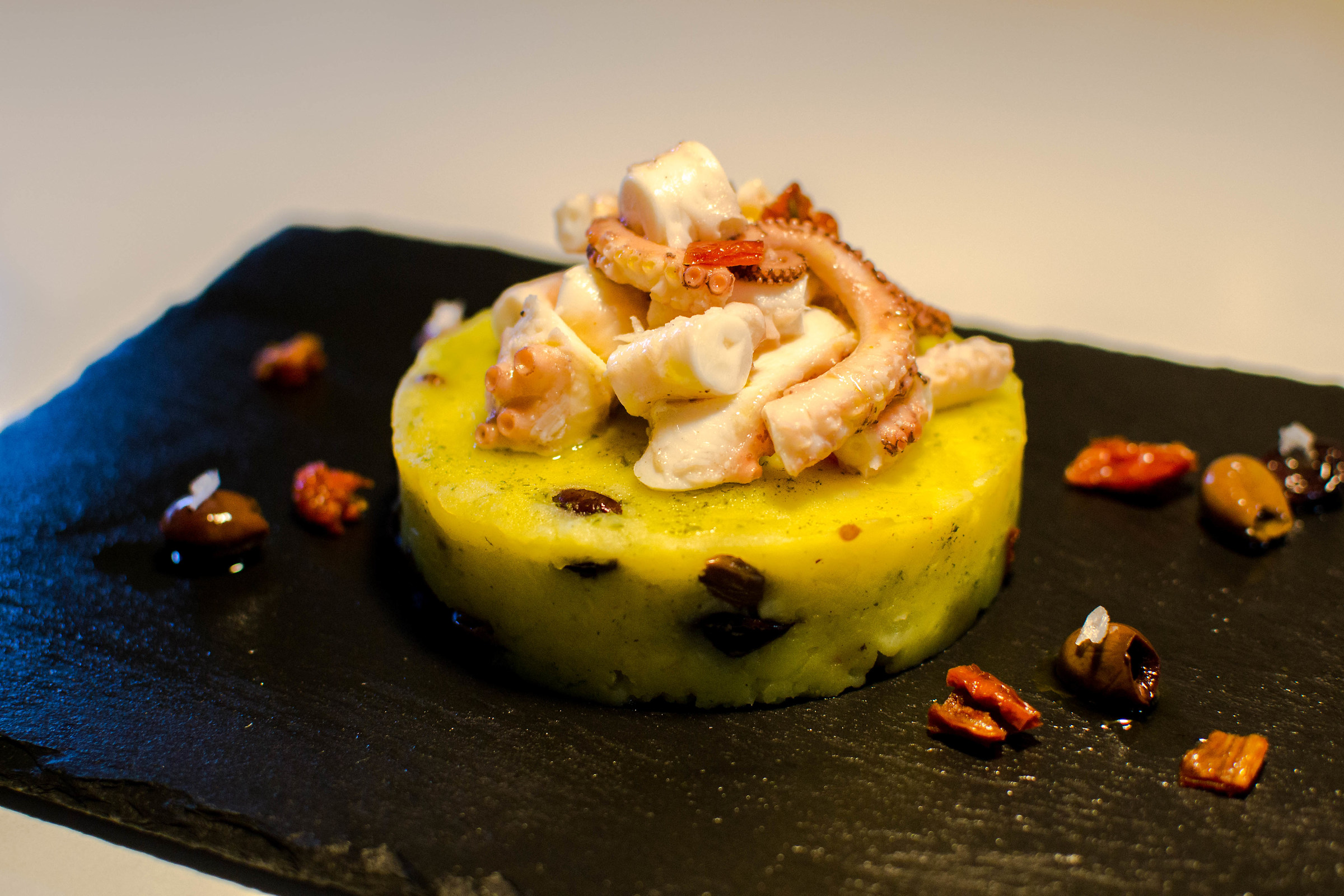 Octopus Potatoes olives and sundried tomatoes.