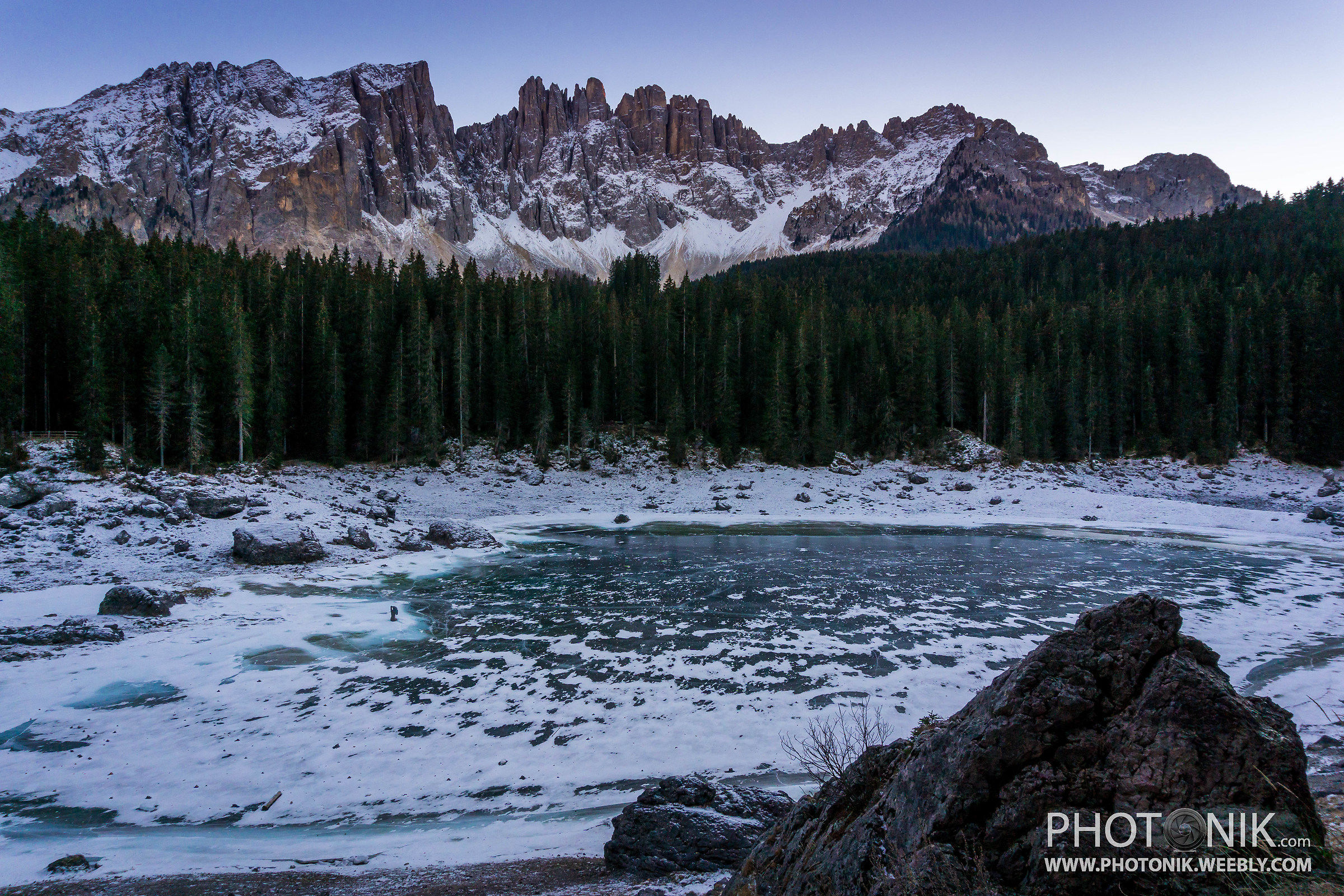 Sunset at the frozen lake