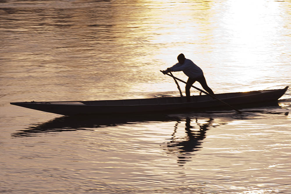 Paddling ... slides off the boat