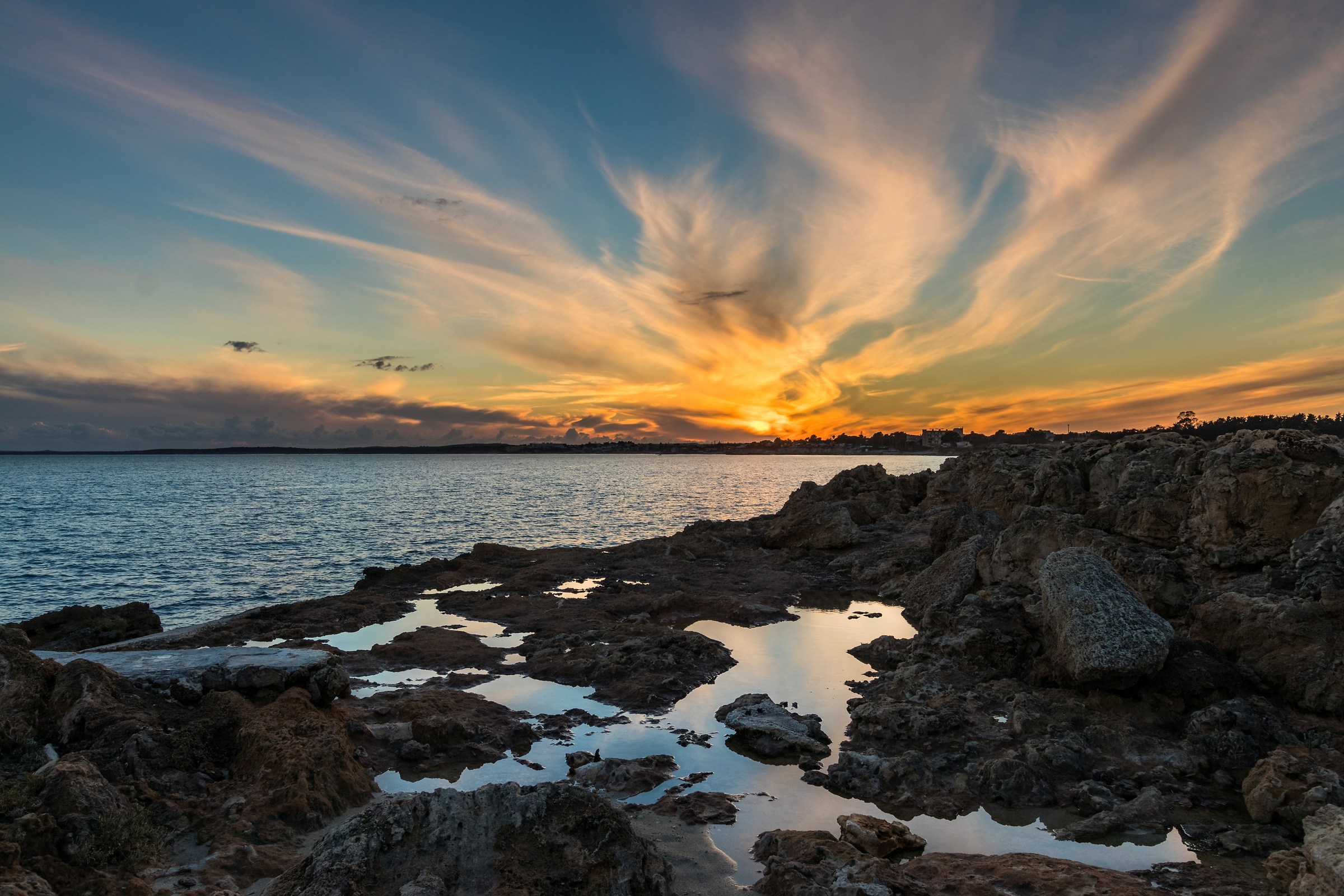 On the rock at sunset