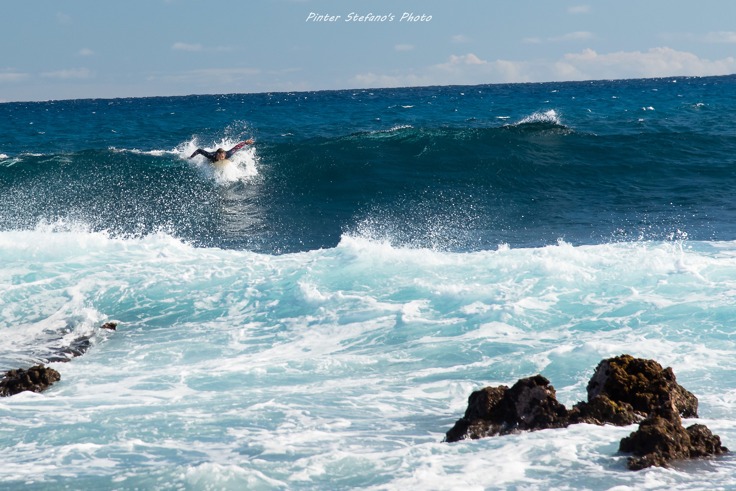 Surfing at Sandy Beach