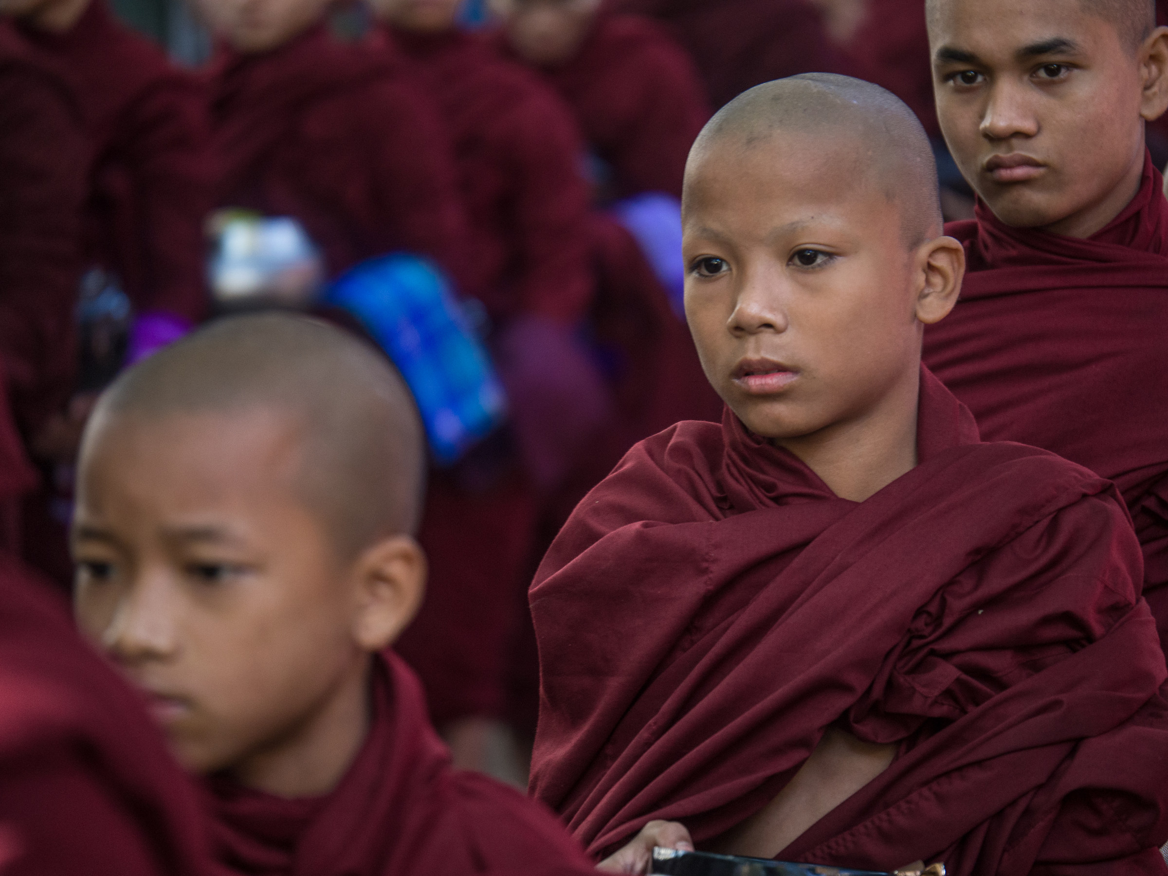 Monks in the queue for breakfast, Amarapura, Burma