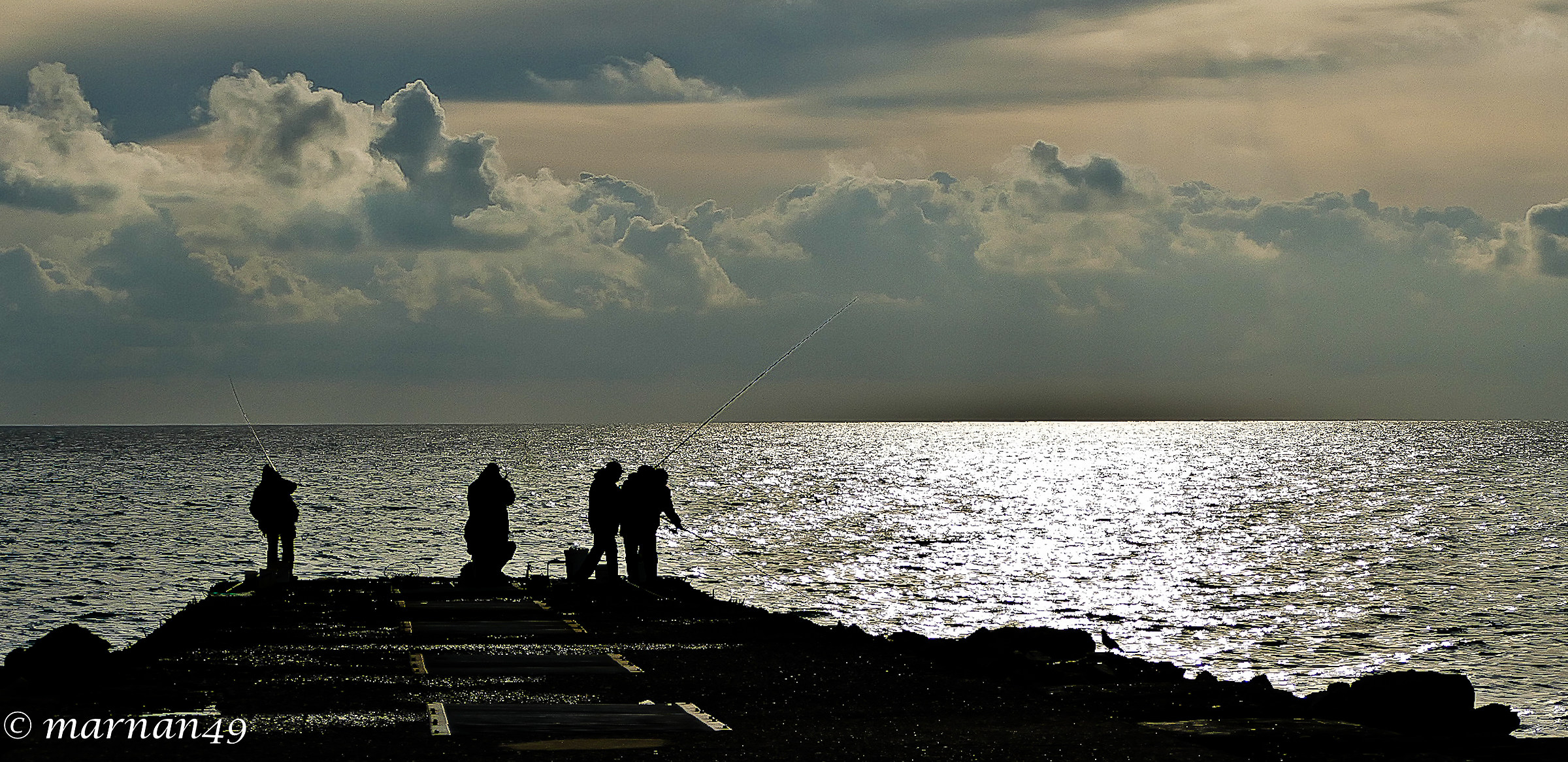 Genova Foce backlit Fishermen