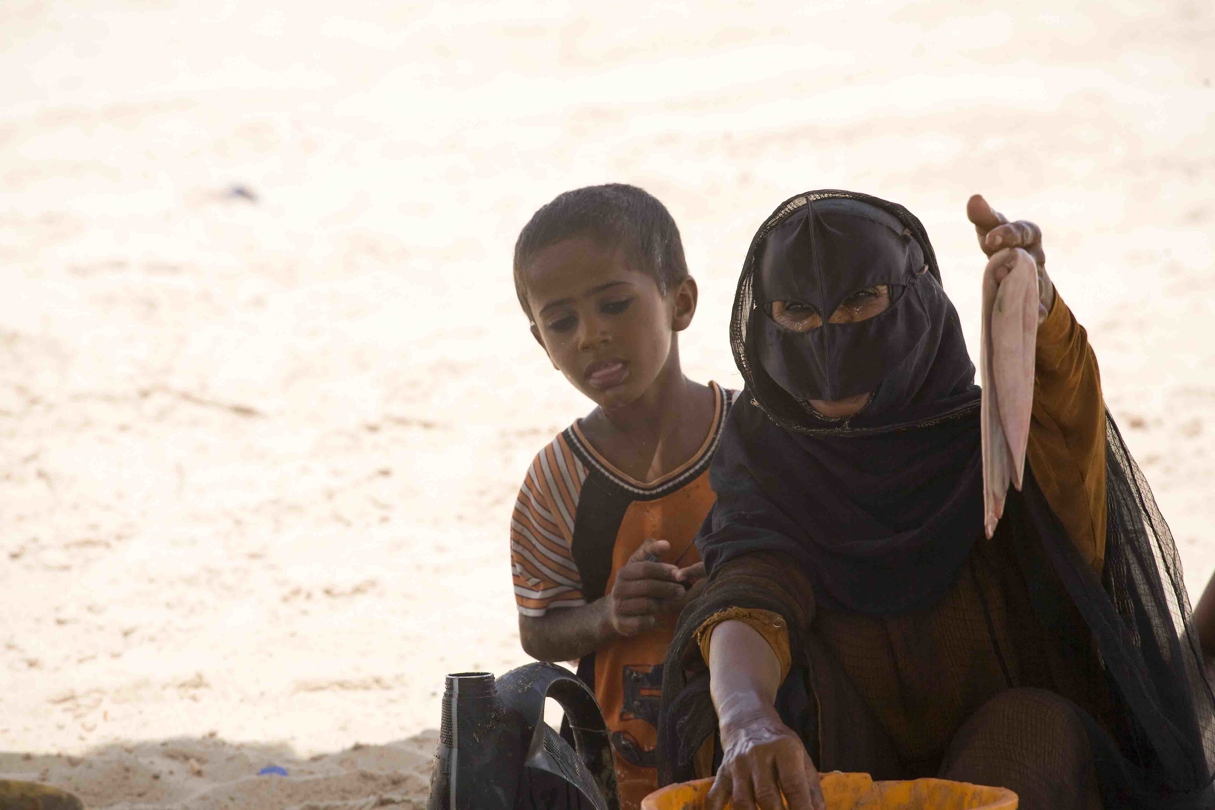 Grandma sells fish - Oman