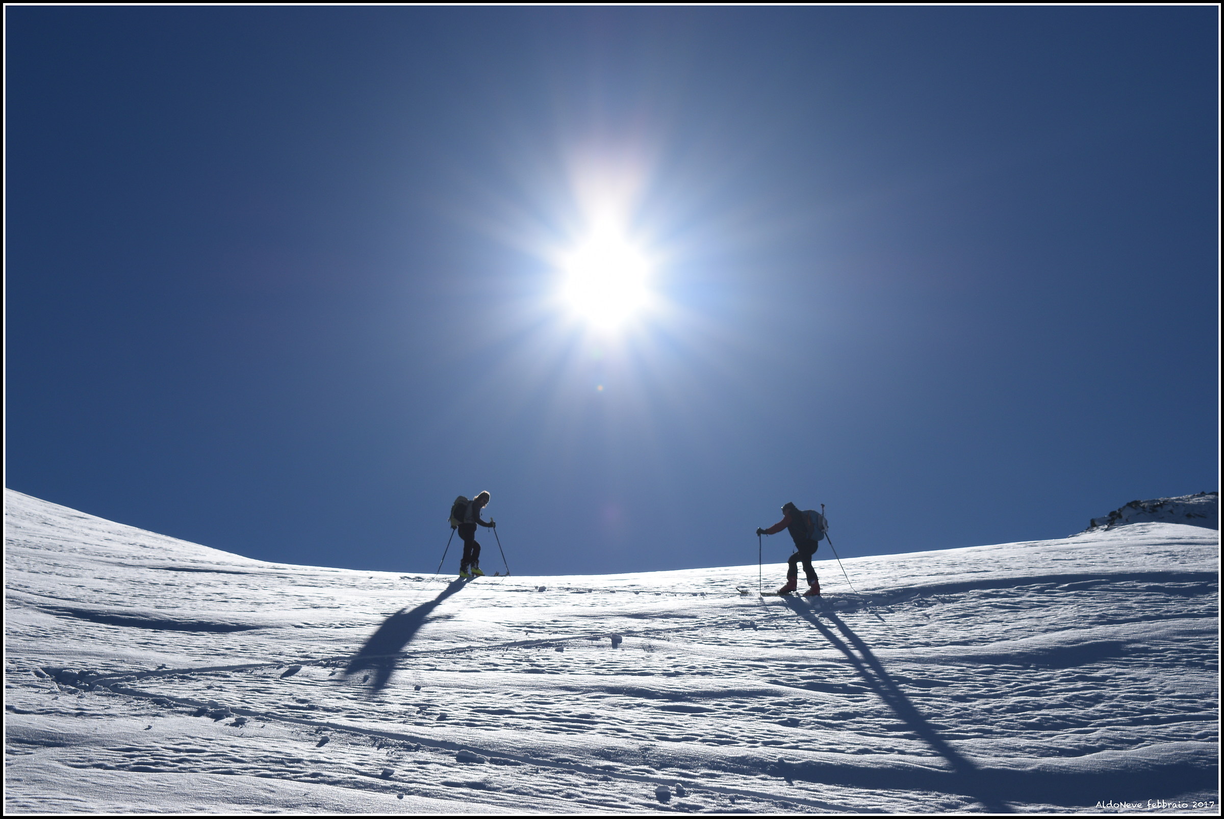 Track, sky, snow and sun