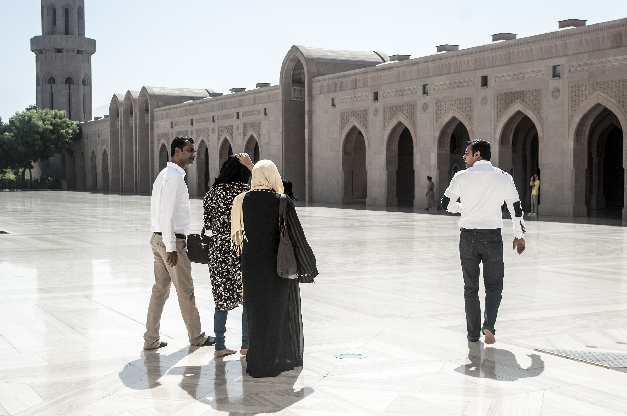 Visitors to the great Sultan Qaboos Grand Mosque